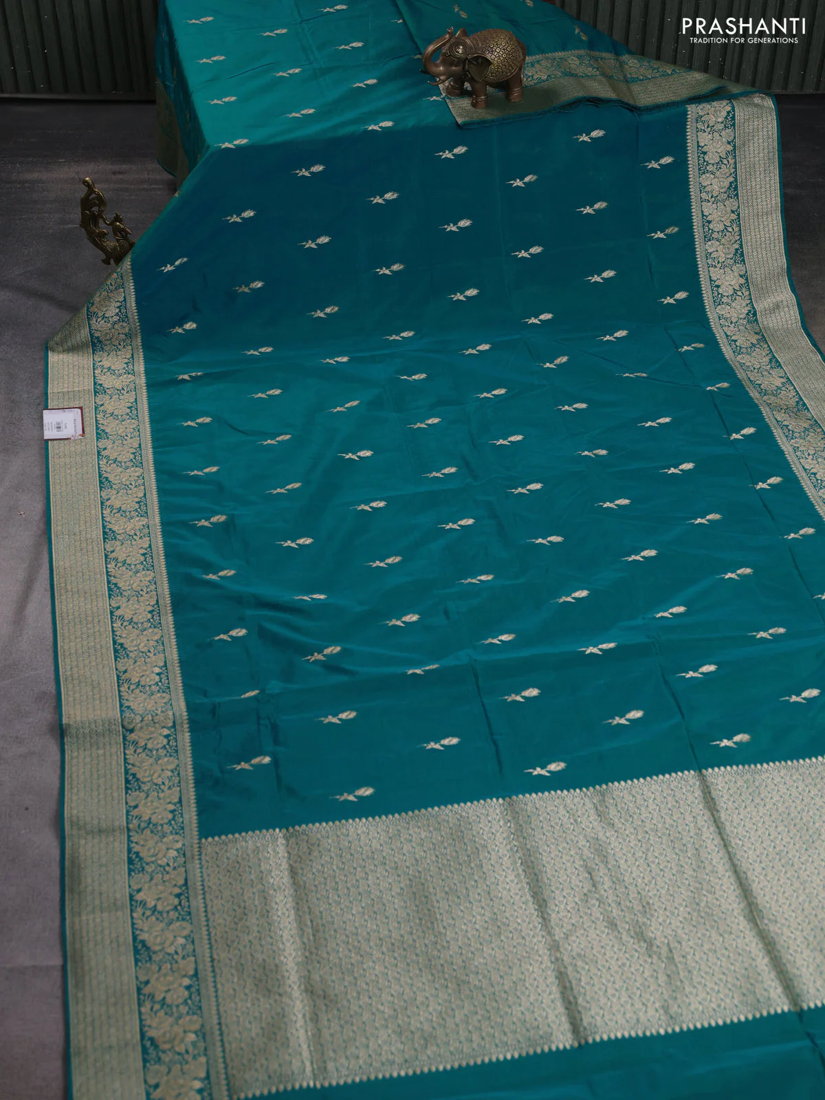 Banarasi semi katan silk saree dual shade of teal bluish green with floral zari woven buttas and zari woven border - Image 2