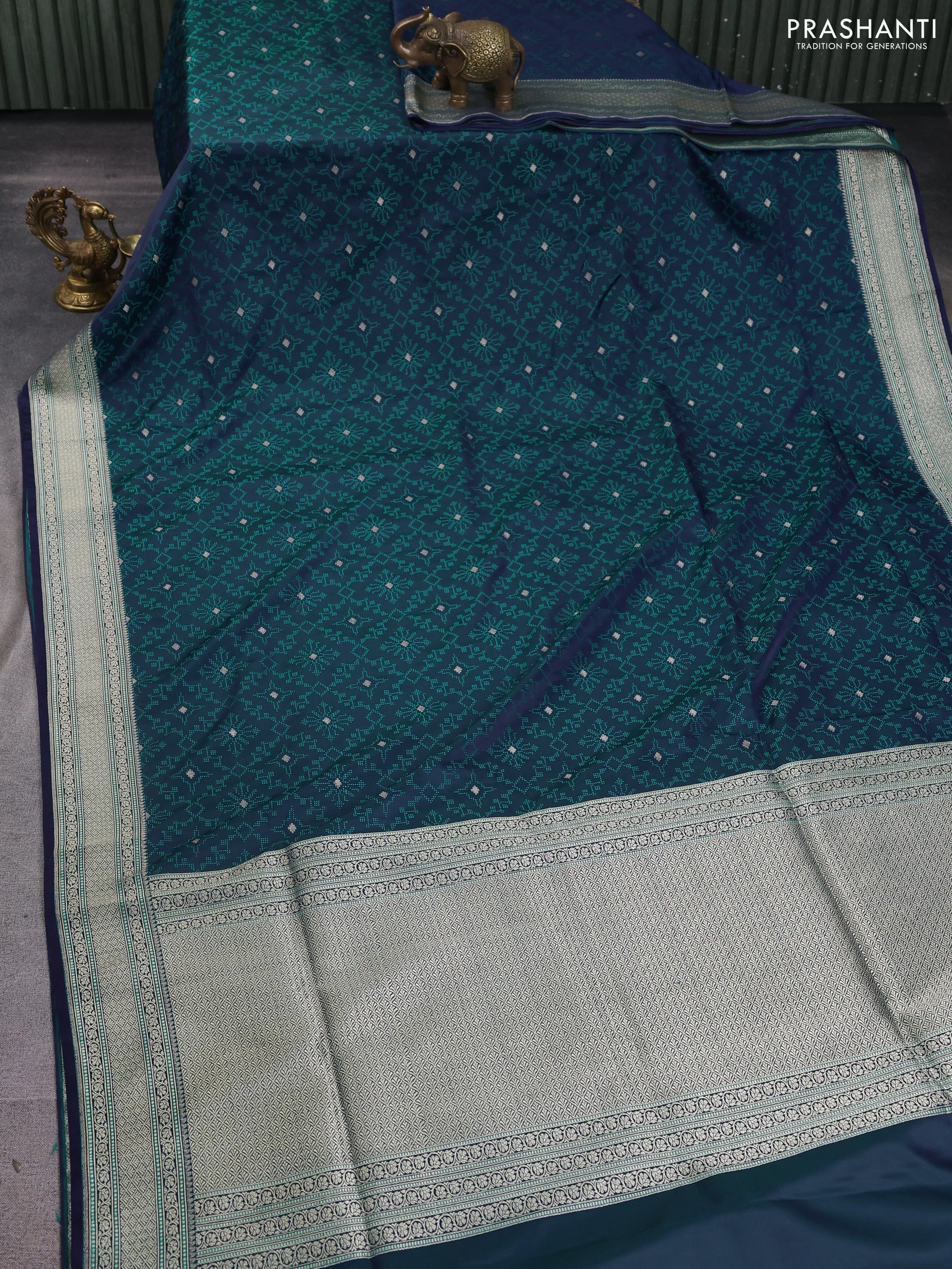 Banarasi semi katan silk saree dual shade of violet and teal green with allover self emboss & zari buttas and zari woven border - Image 2