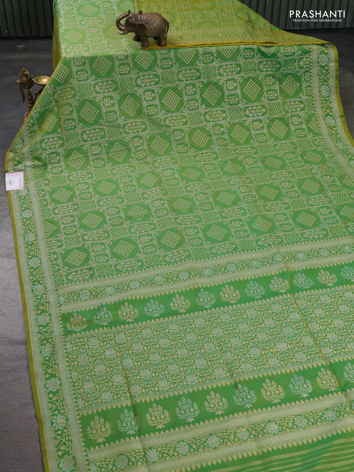 Banarasi semi katan silk saree light green with allover silver & gold zari woven buttas and zari woven border - Image 2