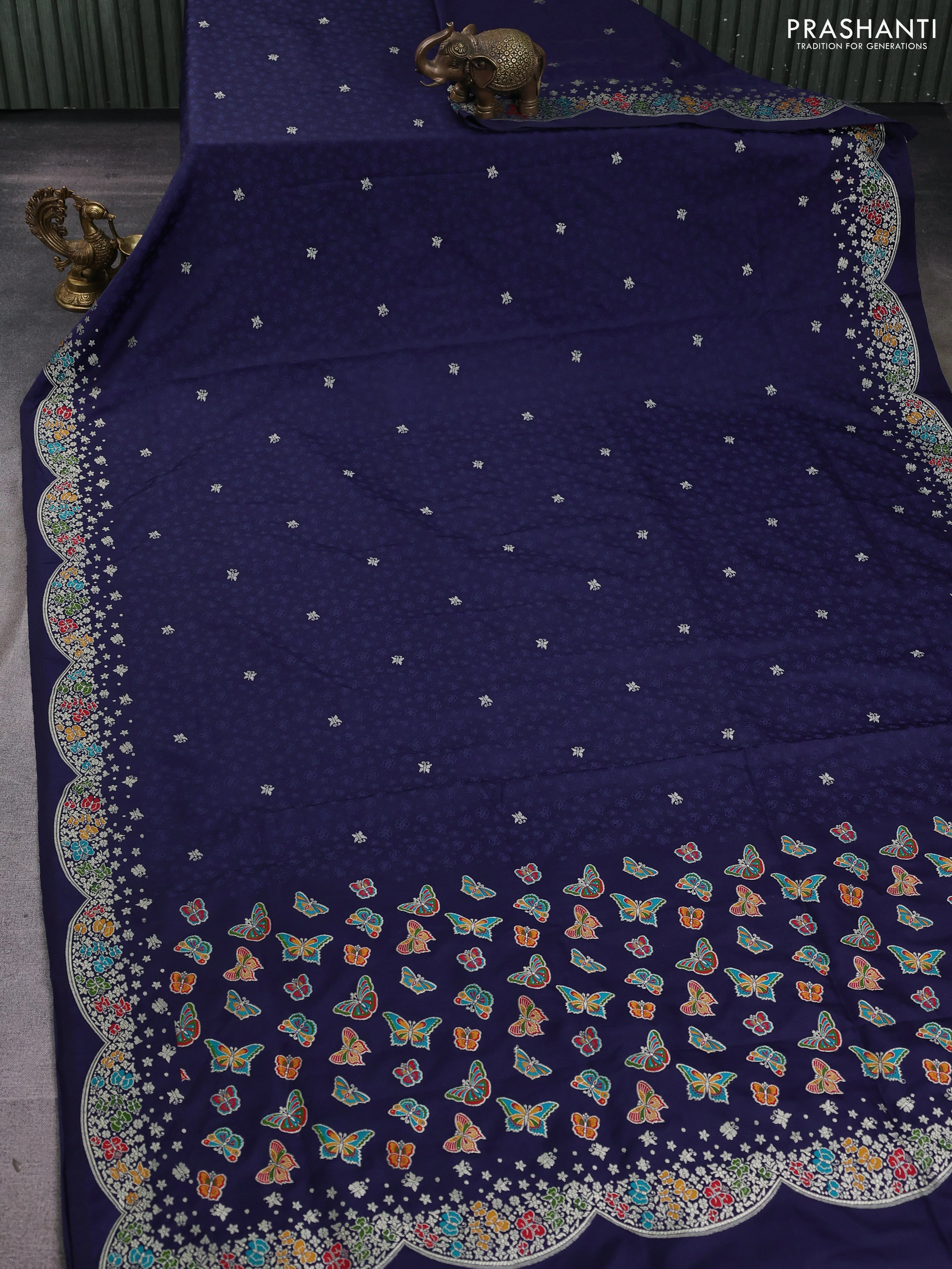 Banarasi semi katan silk saree naby blue with allover self emboss & zari buttas and woven border - Image 2