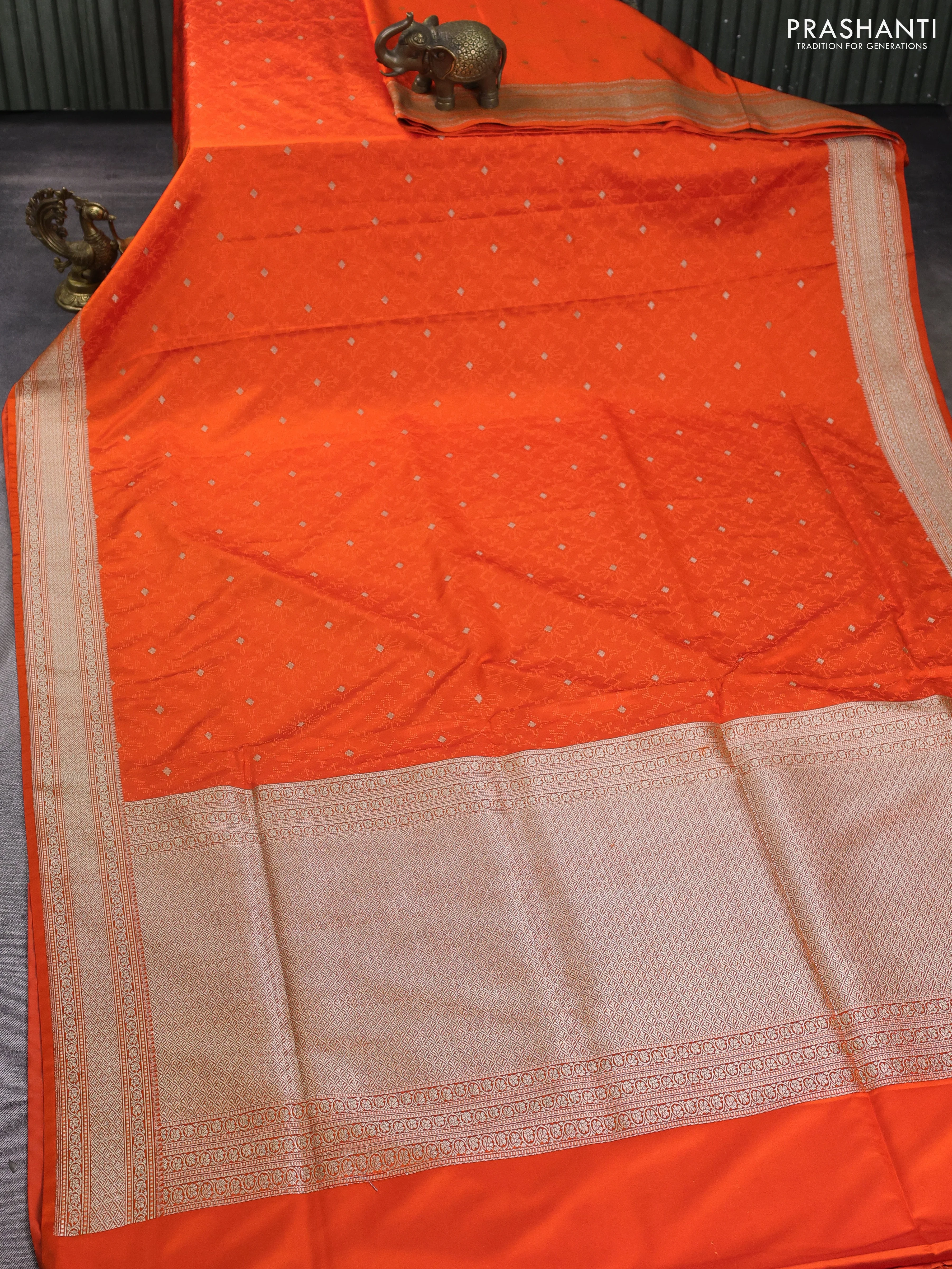 Banarasi semi katan silk saree orange with allover self emboss & zari buttas and zari woven border - Image 2