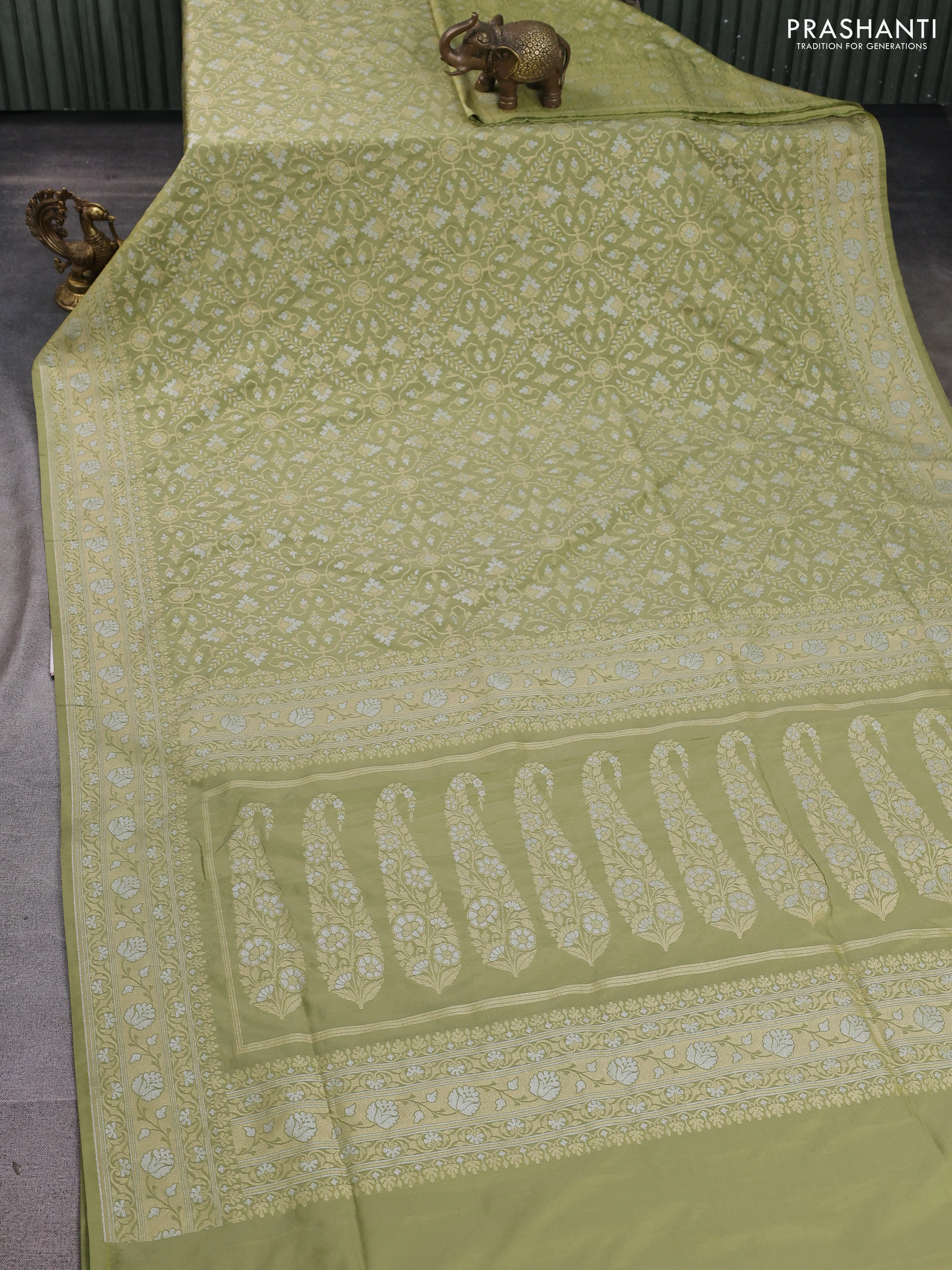 Banarasi semi katan silk saree pastel green with allover silver & gold zari weaves and zari woven border - Image 2