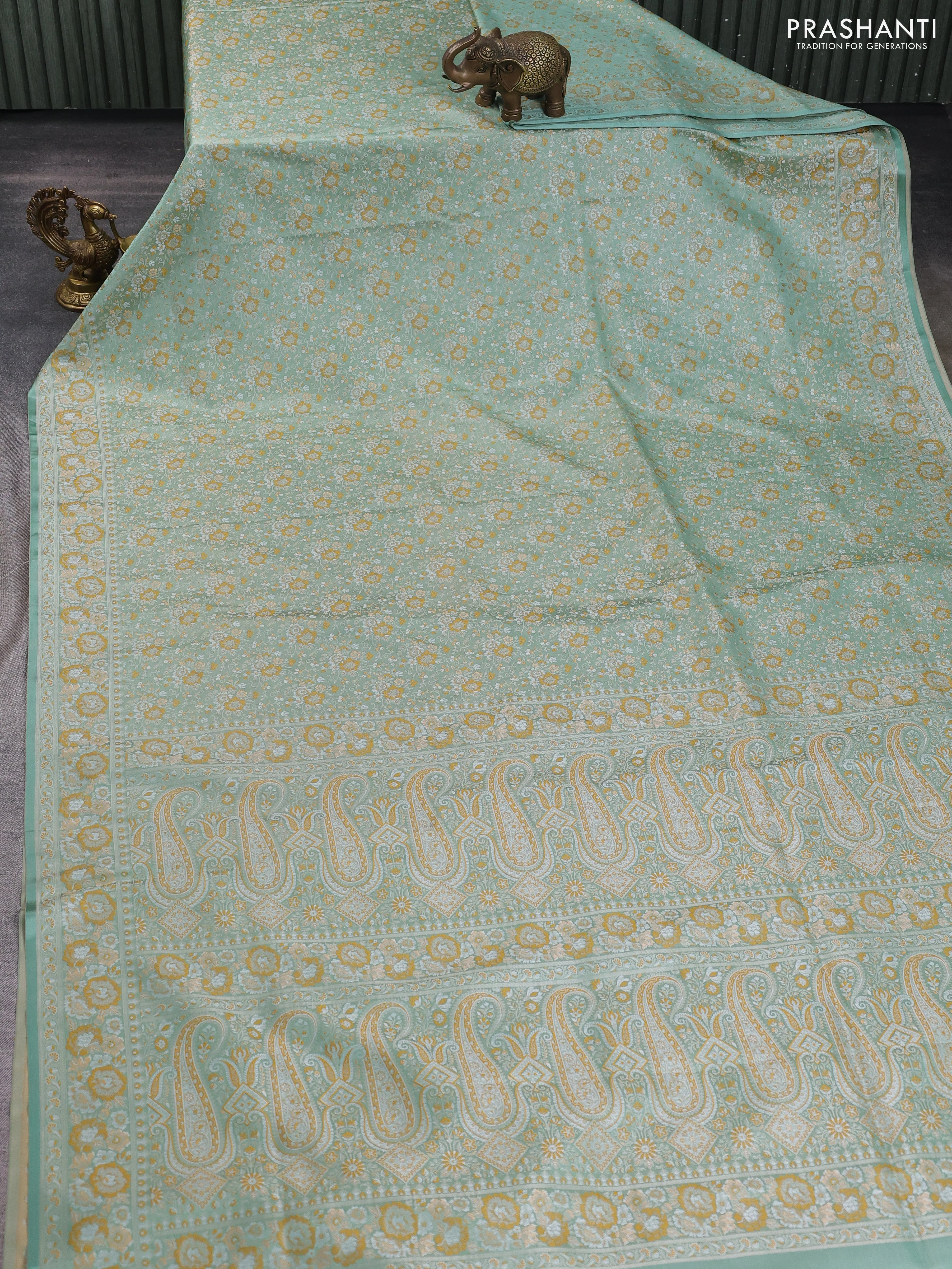 Banarasi semi katan silk saree pastel green with allover thread brocade weaves and thread woven border - Image 2
