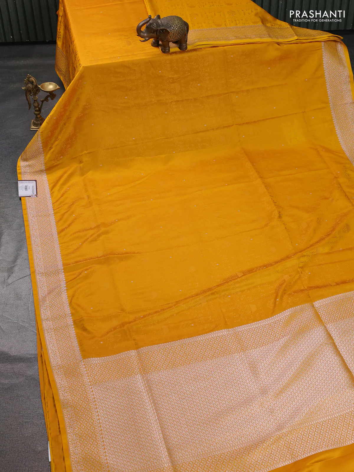 Banarasi semi katan silk saree yellow with allover self emboss and copper zari woven border - Image 2