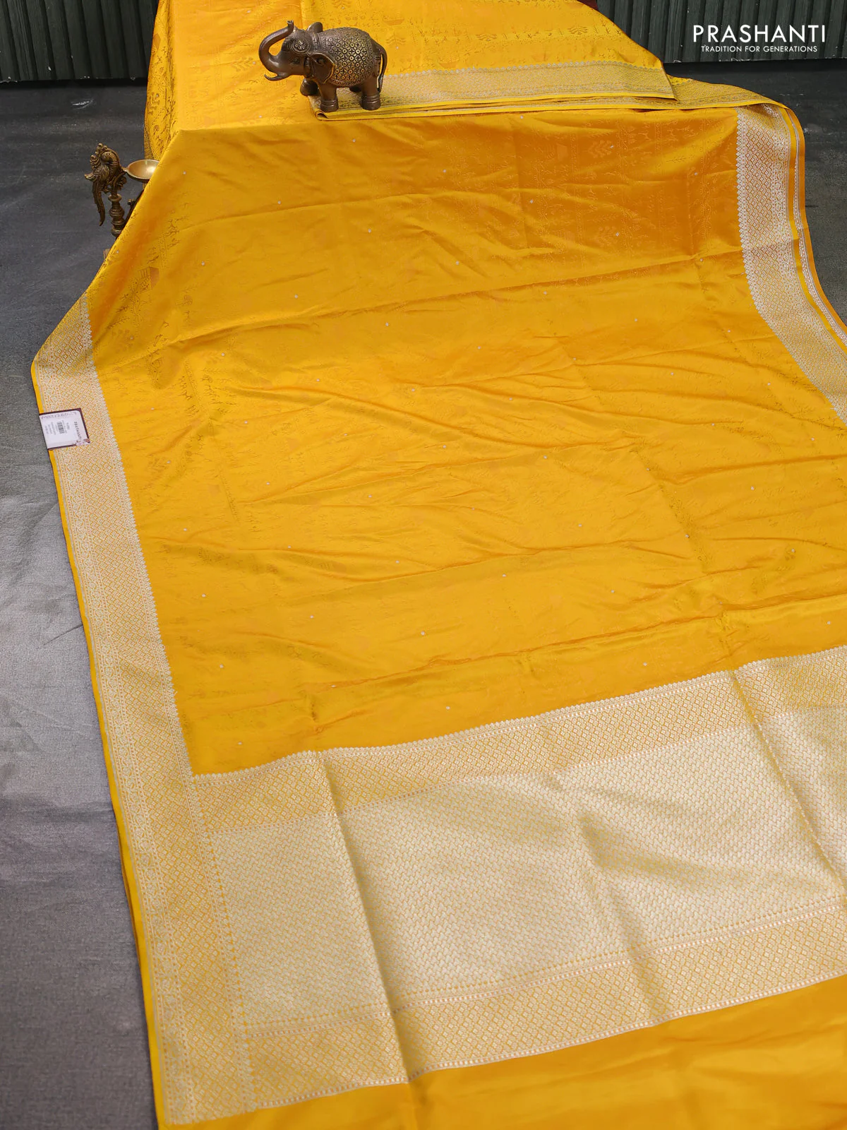 Banarasi semi katan silk saree yellow with allover self emboss and copper zari woven border - Image 2