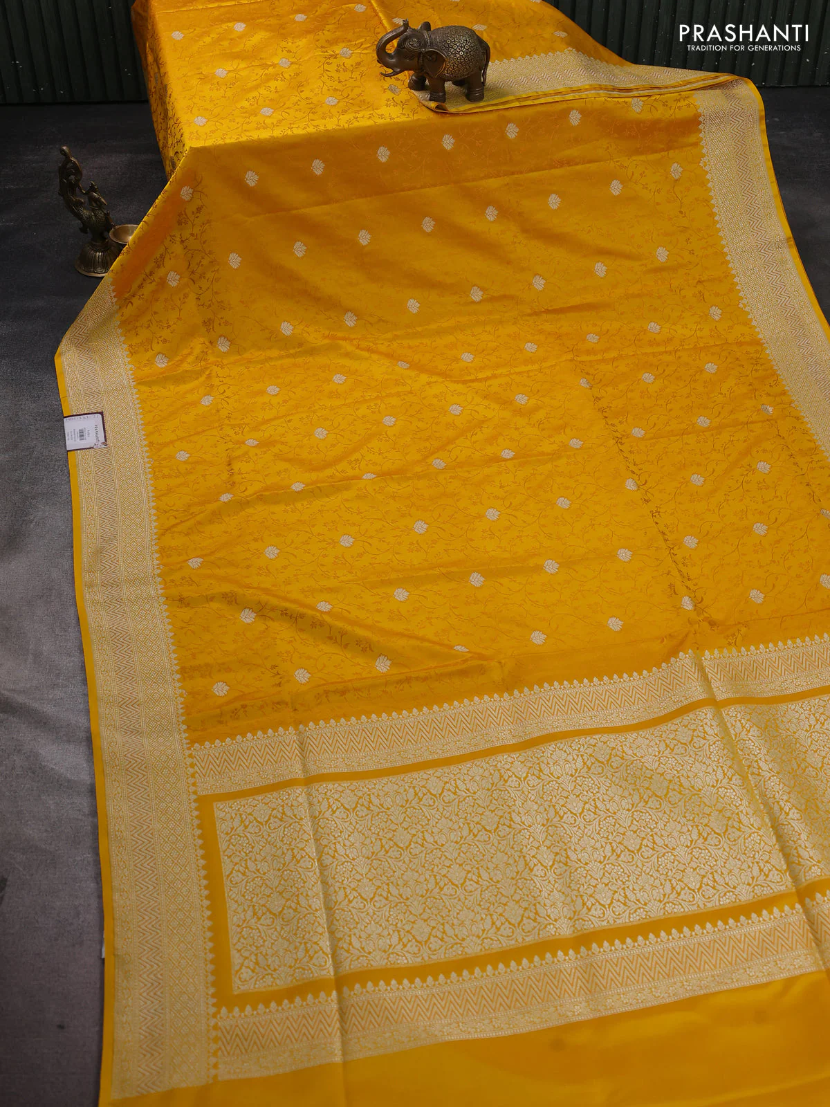 Banarasi semi katan silk saree yellow with allover self emboss & zari buttas and zari woven border - Image 2