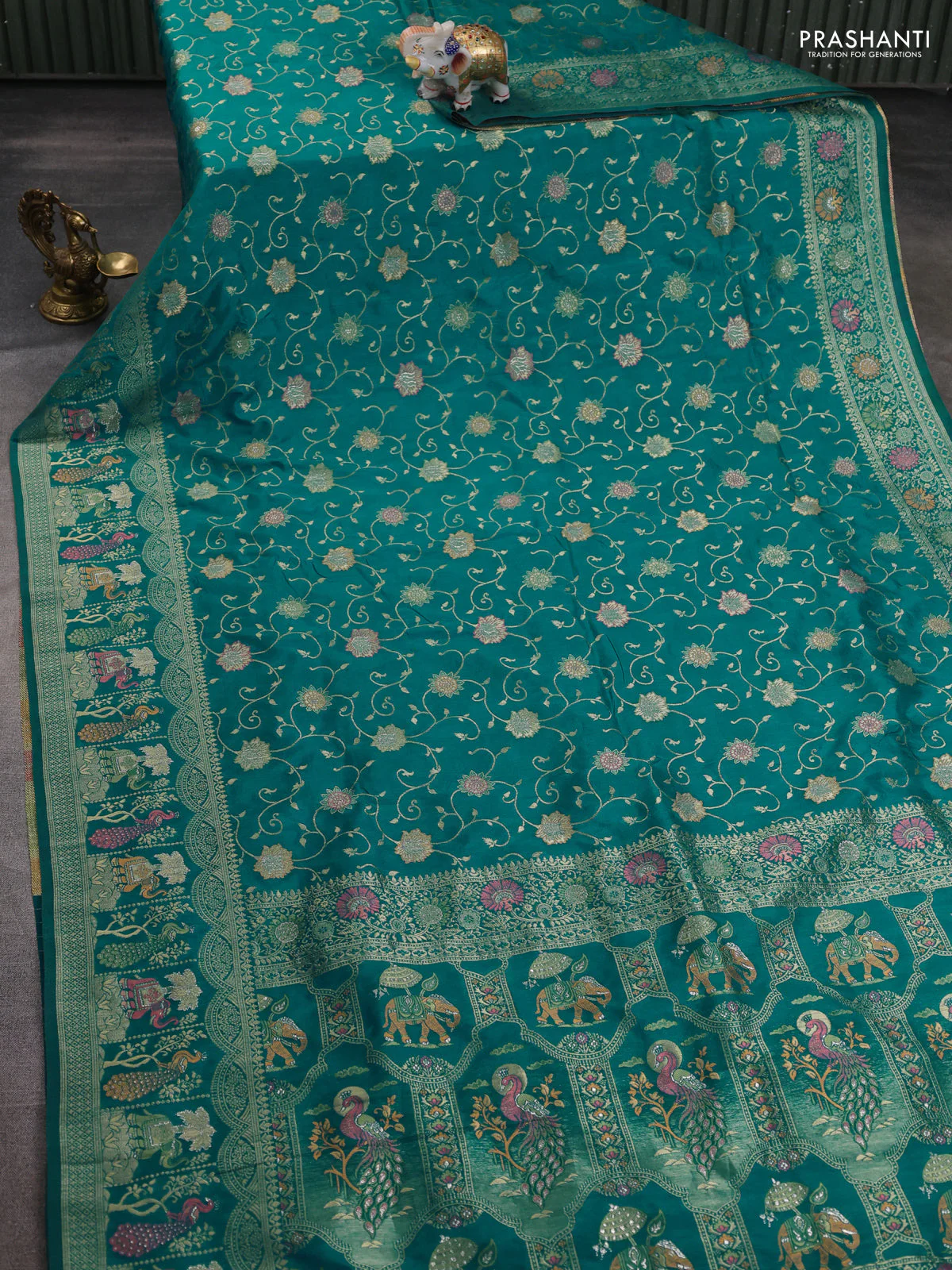 Banarasi semi raw silk saree teal blue with allover floarl zari weaves and thread & zari woven border - Image 3