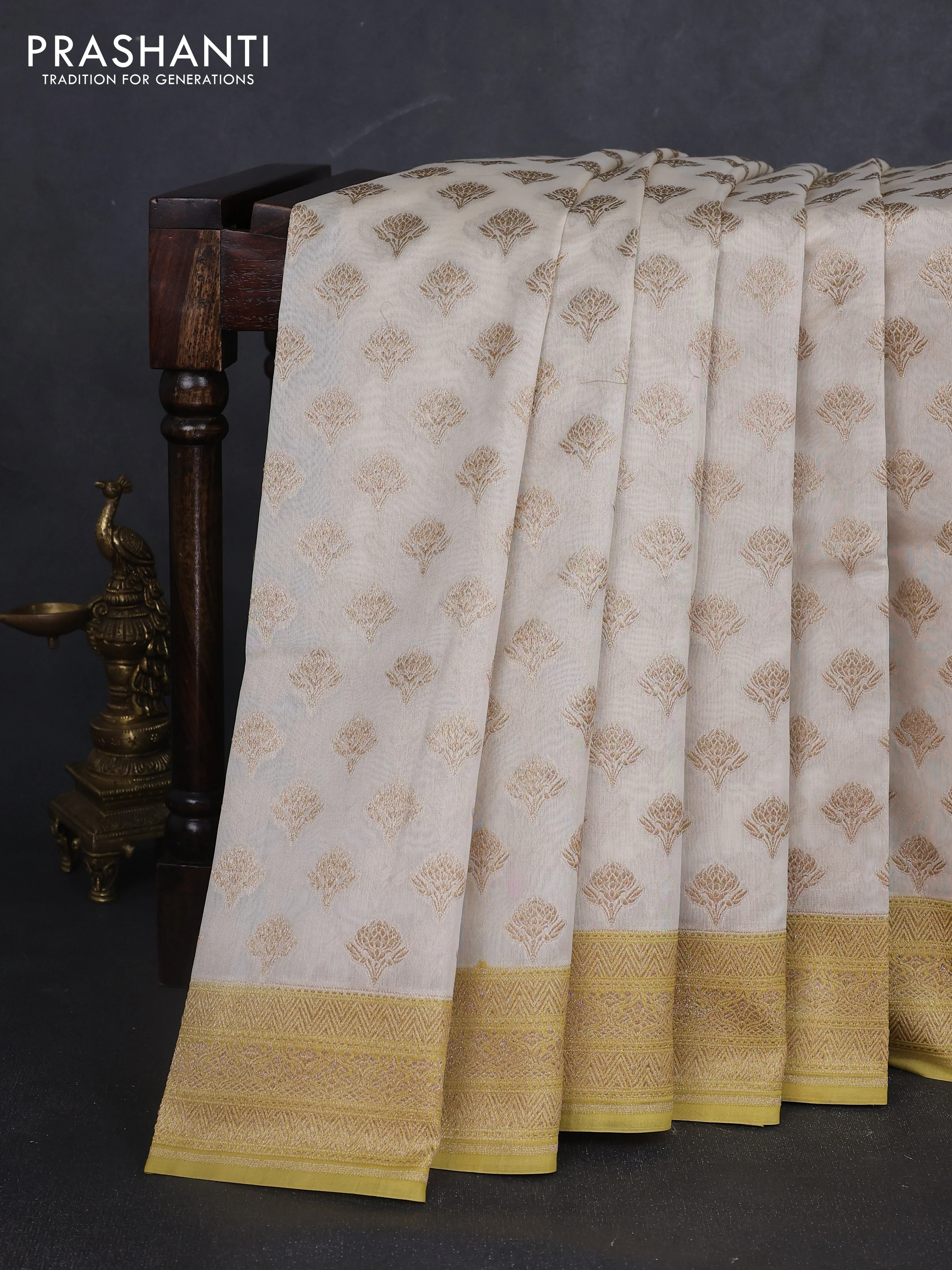 Banarasi silk cotton saree cream and pale yellow with allover thread & zari woven buttas and woven border