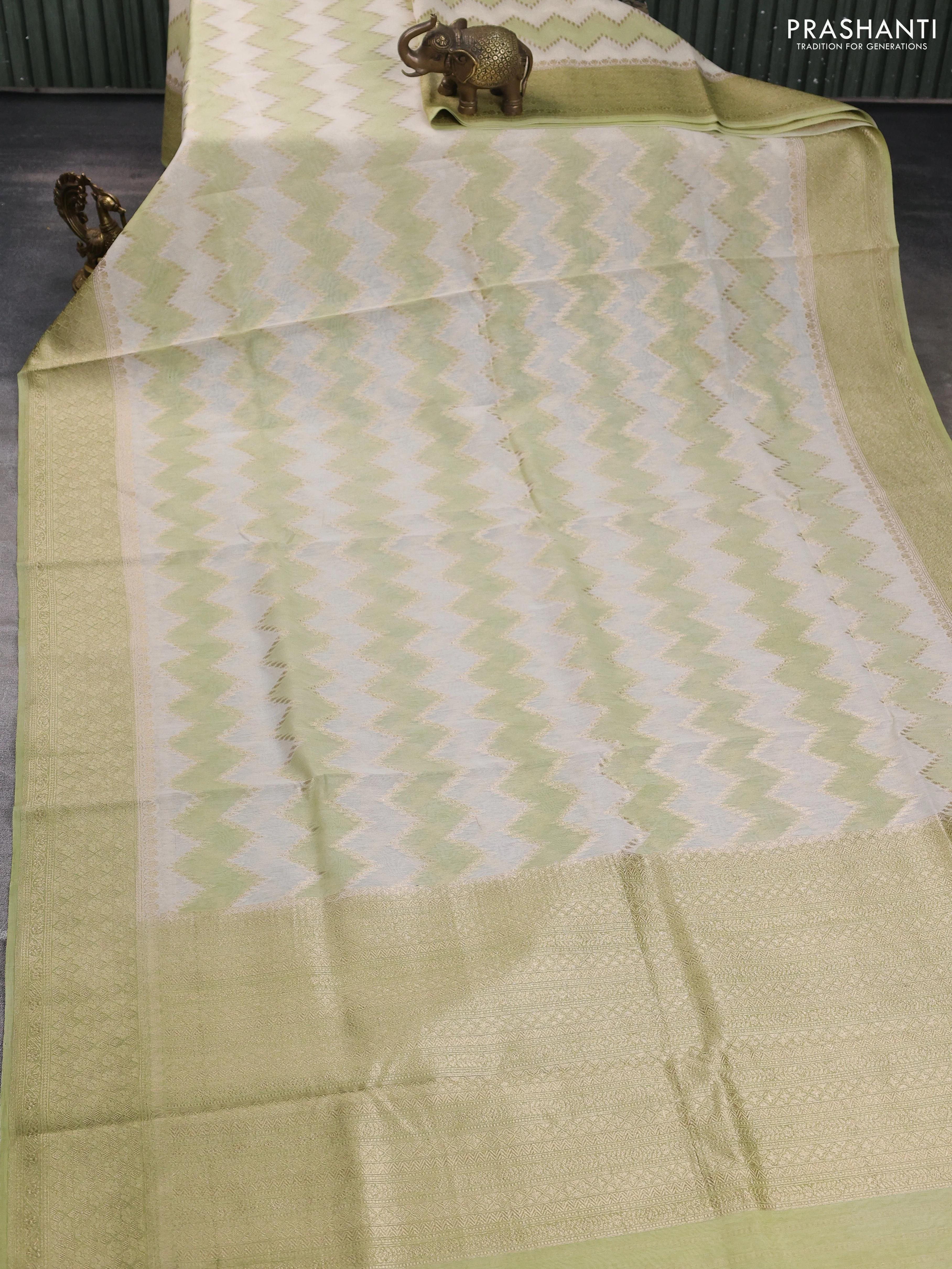 Banarasi silk cotton saree cream and pista green with allover zari weaves and zari woven border - Image 2