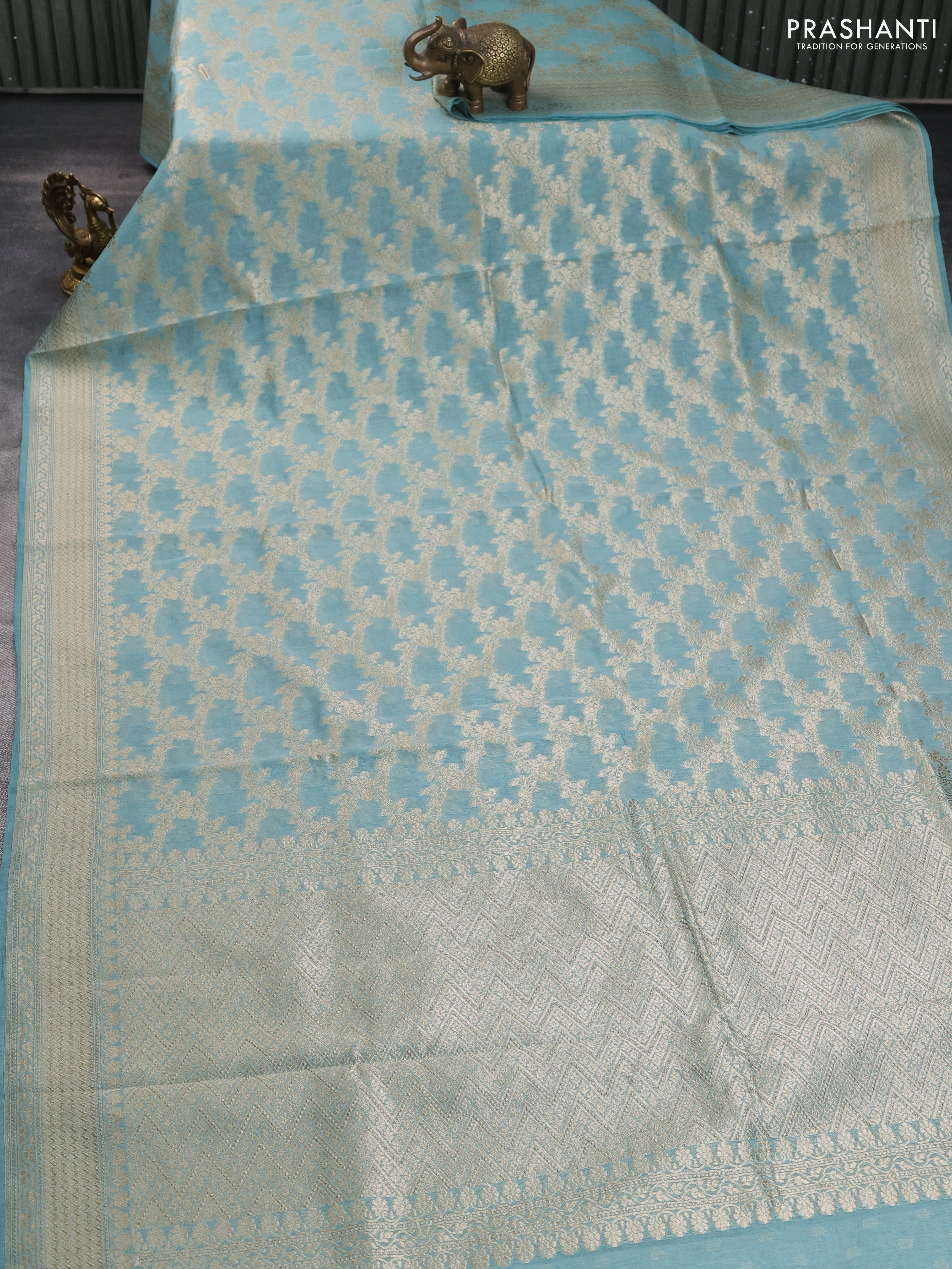 Banarasi silk cotton saree light blue with allover zari weaves and zari woven border - Image 2