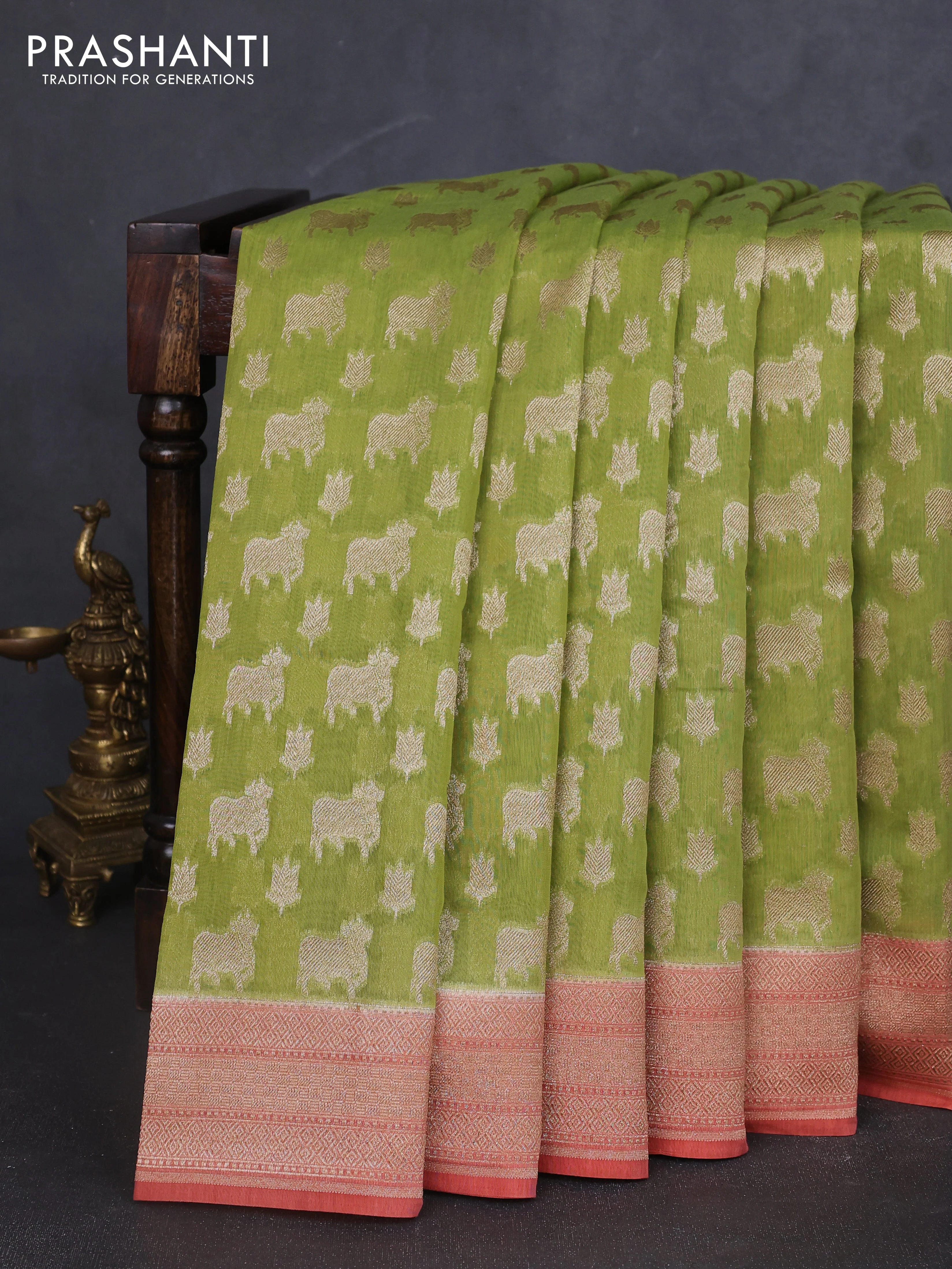 Banarasi silk cotton saree light green and peach shade with allover pichwai zari woven butta weaves and zari woven border