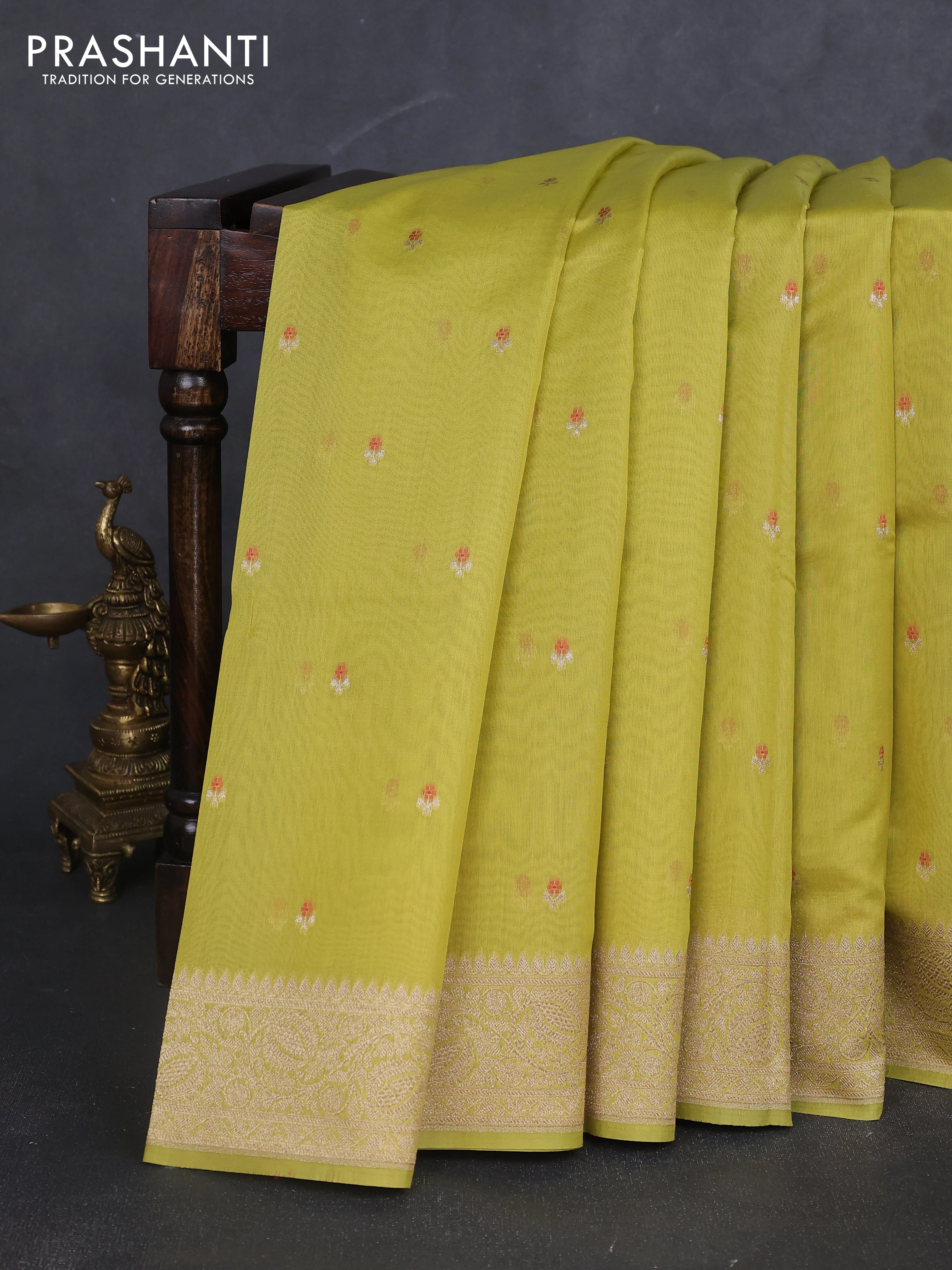 Banarasi silk cotton saree lime green with allover zari woven buttas and zari woven border