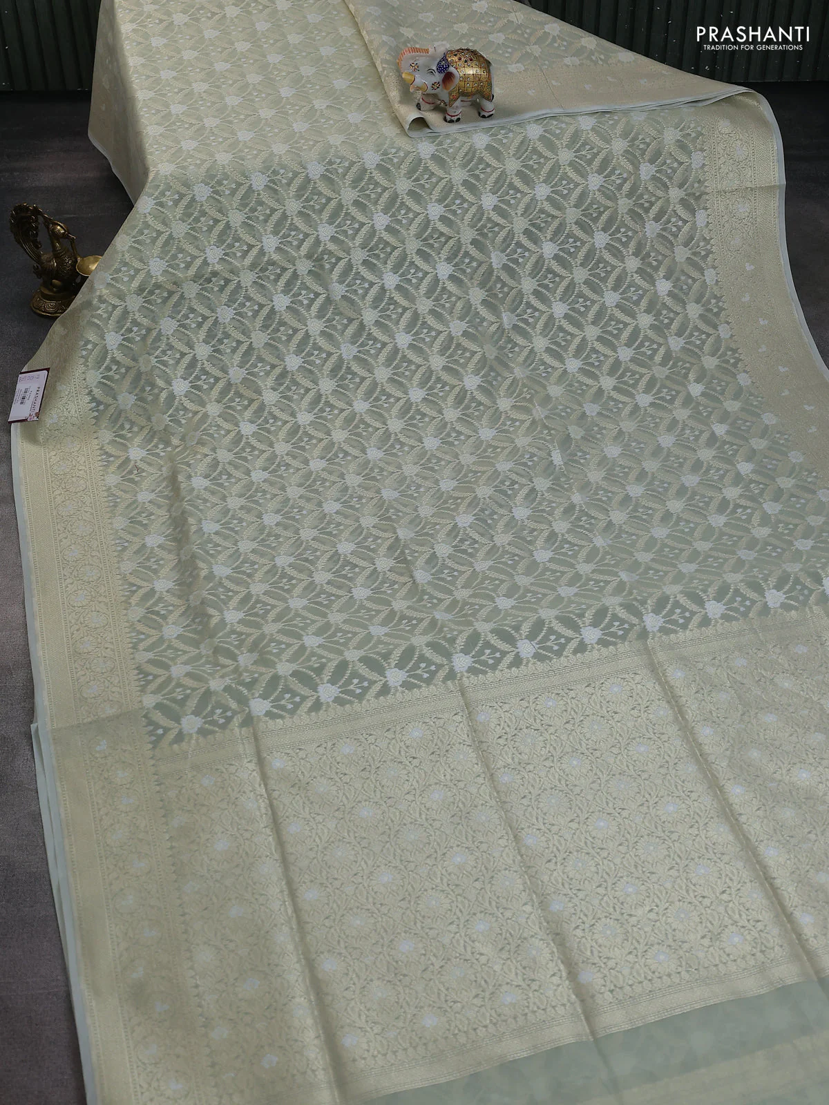 Banarasi silk cotton saree mild pista green with allover zari weaves and zari woven border - Image 2