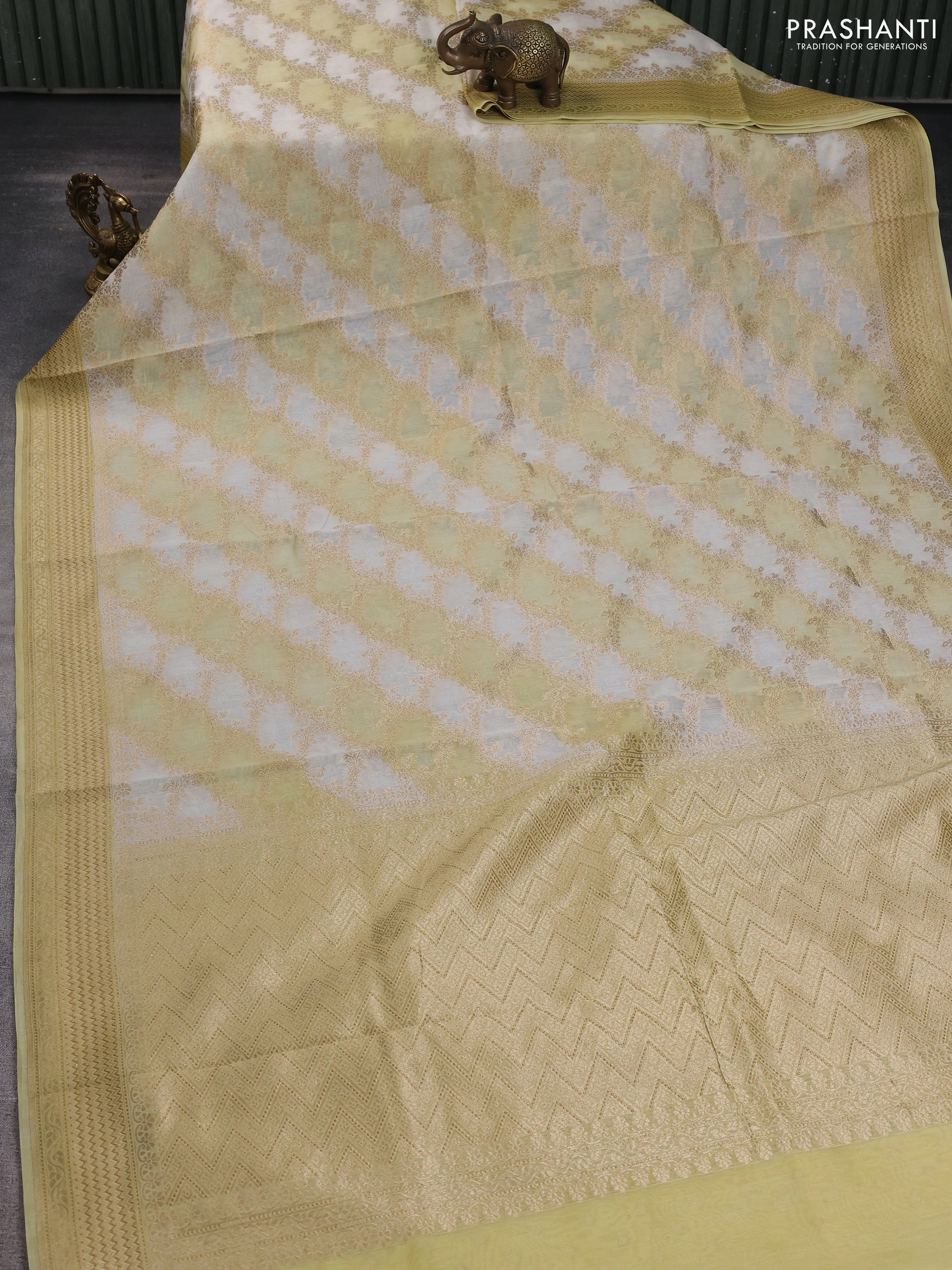 Banarasi silk cotton saree off white and pale yellow with allover zari weaves and zari woven border - Image 2