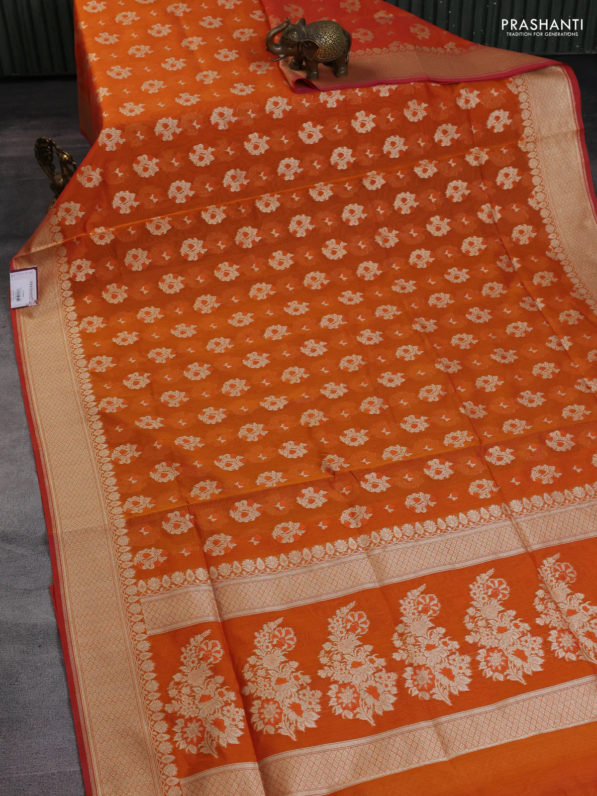 Banarasi silk cotton saree orange with allover floral zari woven buttas and zari woven border - Image 2