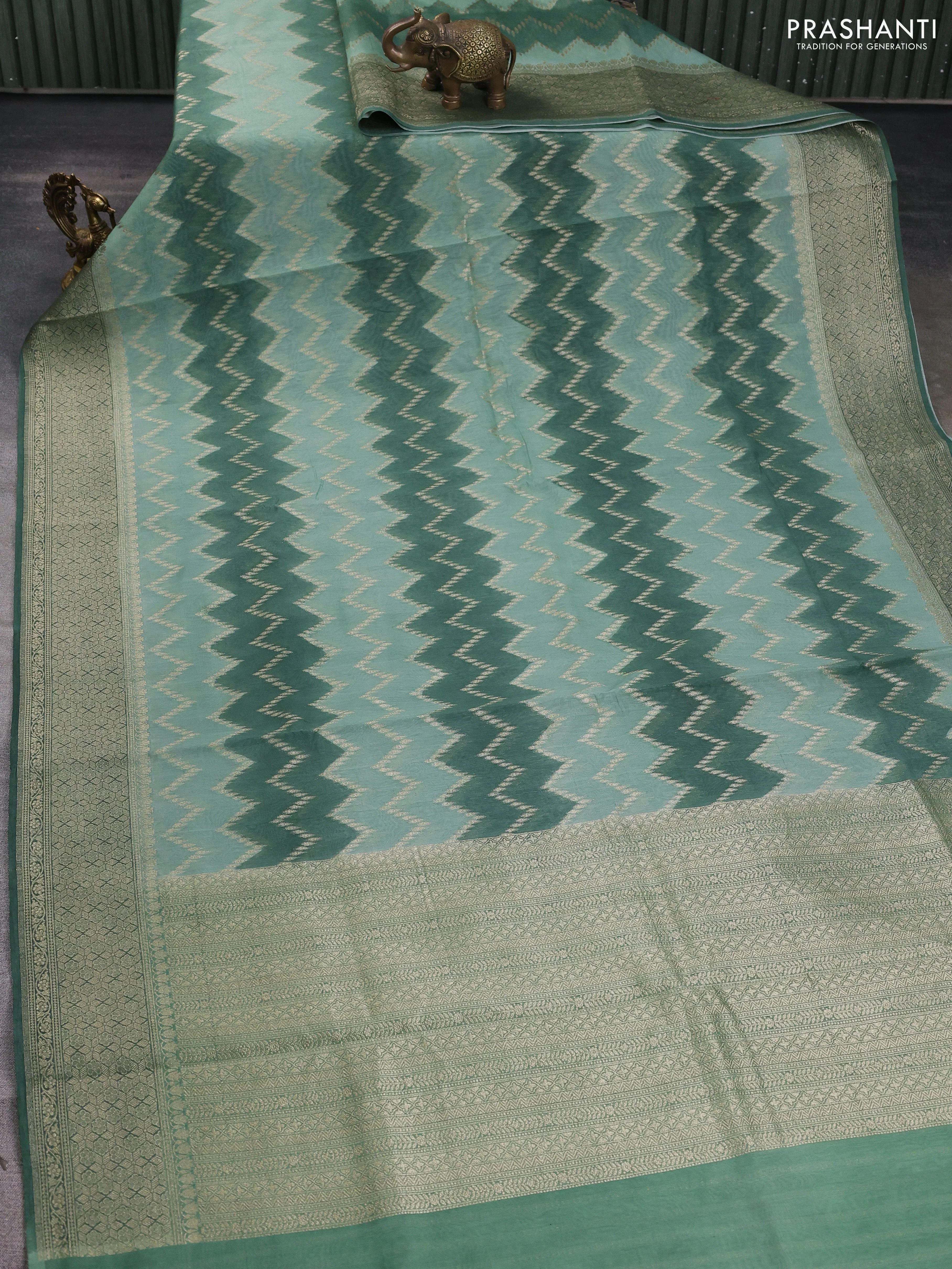 Banarasi silk cotton saree pastel green and green with allover zari weaves and zari woven border - Image 2