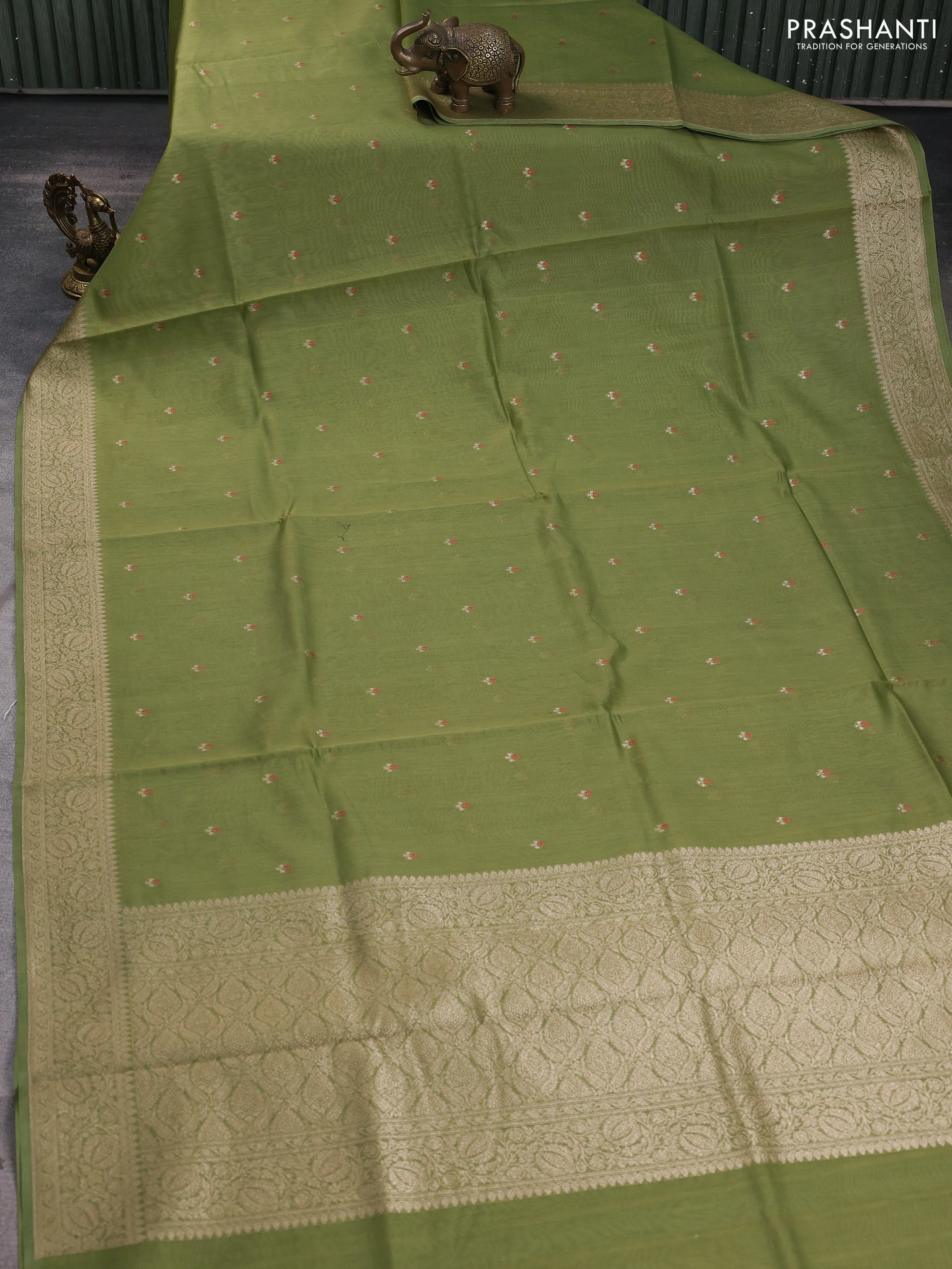 Banarasi silk cotton saree pastel green with allover zari woven buttas and zari woven border - Image 2