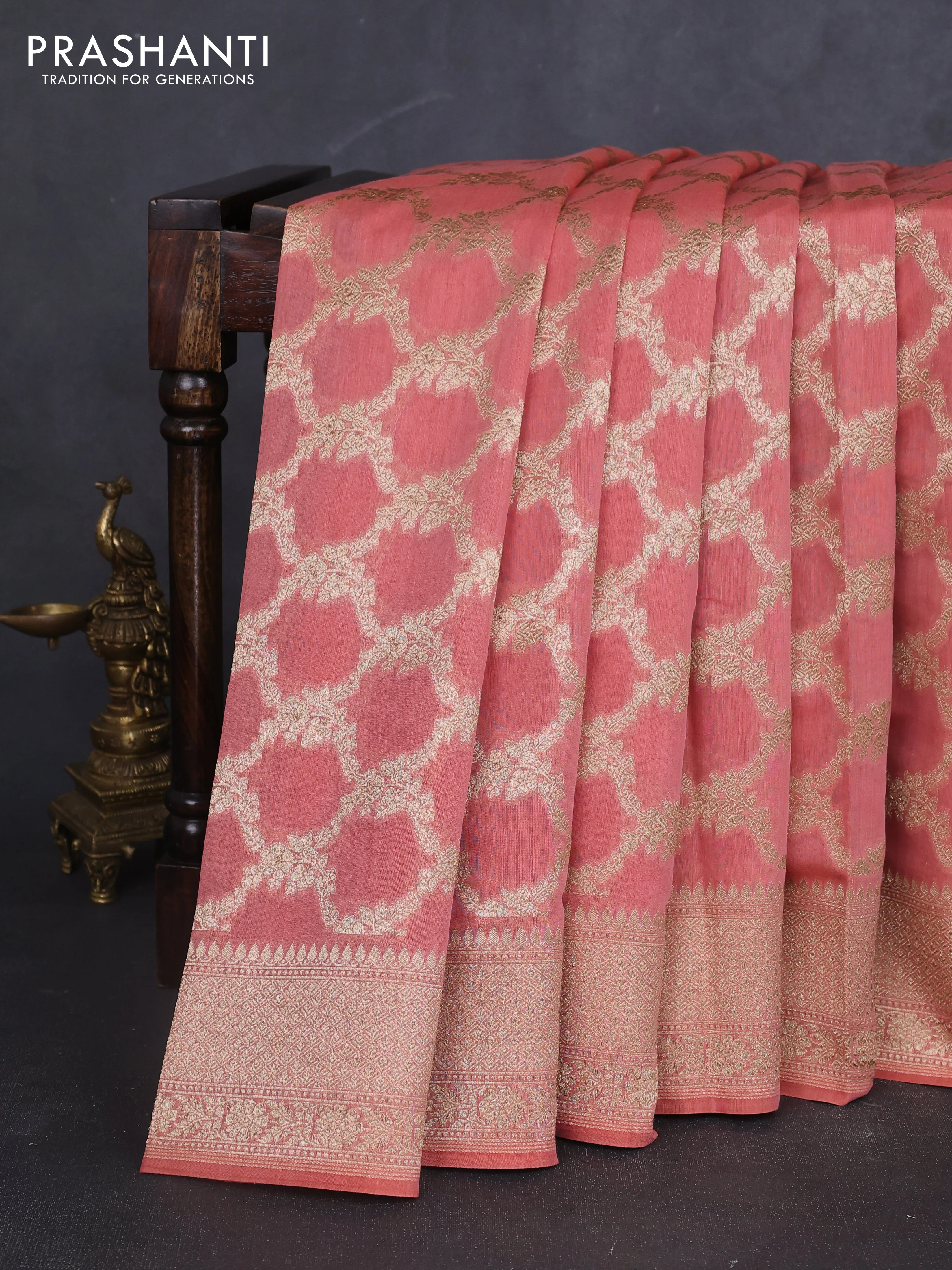 Banarasi silk cotton saree peach pink with allover zari weaves and zari woven border