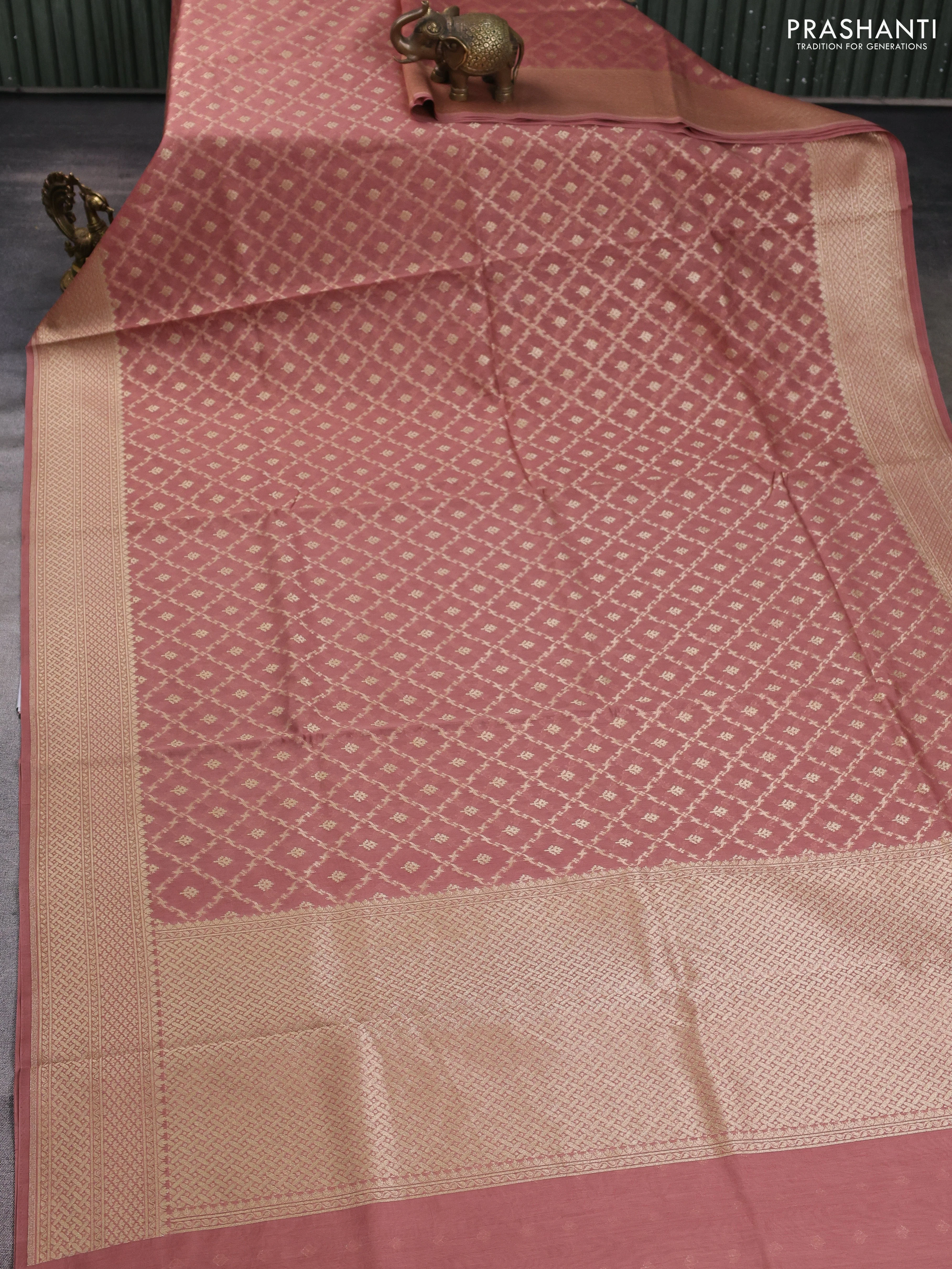Banarasi silk cotton saree peach shade with allover zari woven buttas and zari woven border - Image 2