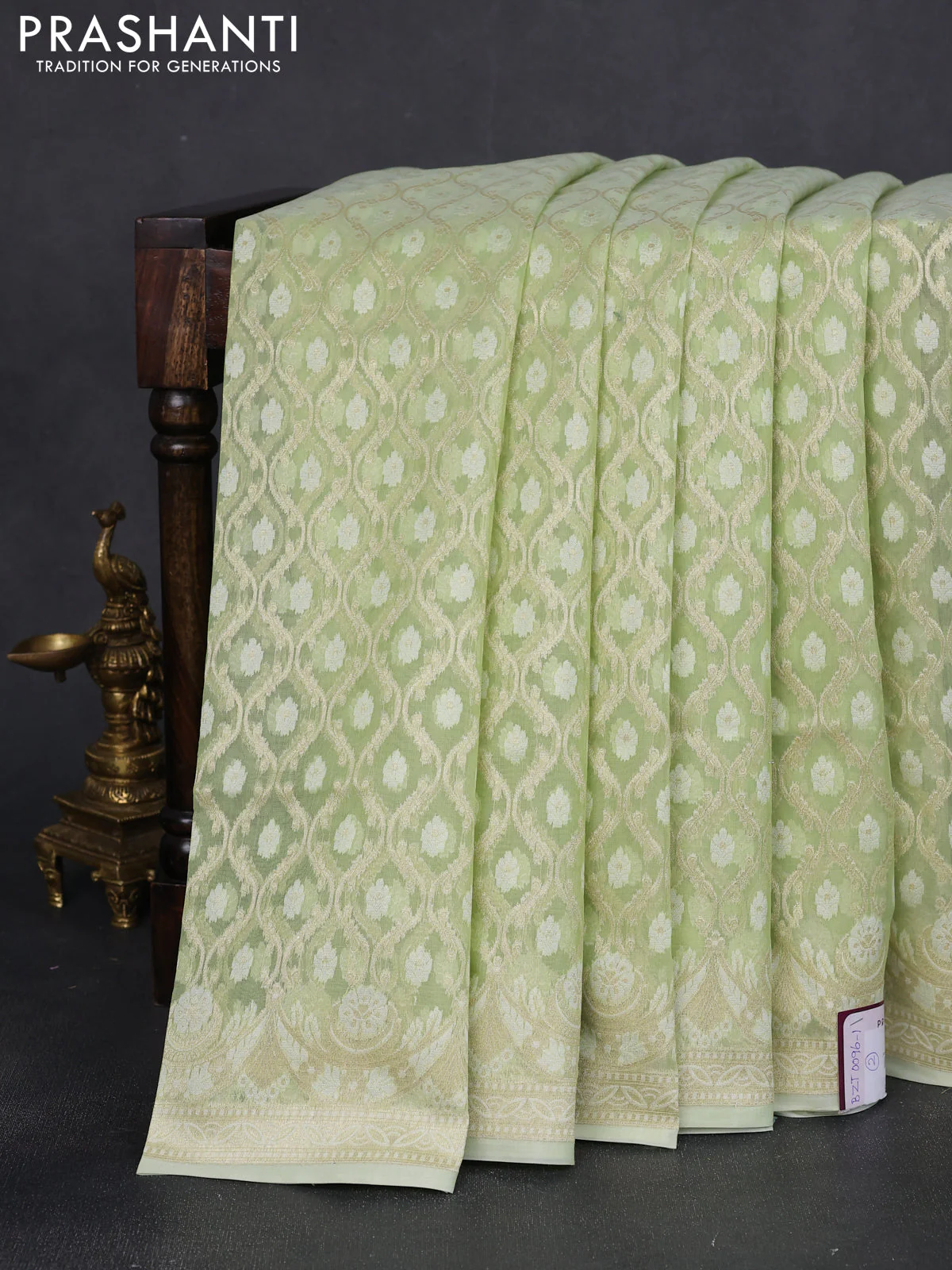 Banarasi silk cotton saree pista green with allover zari weaves and zari woven border