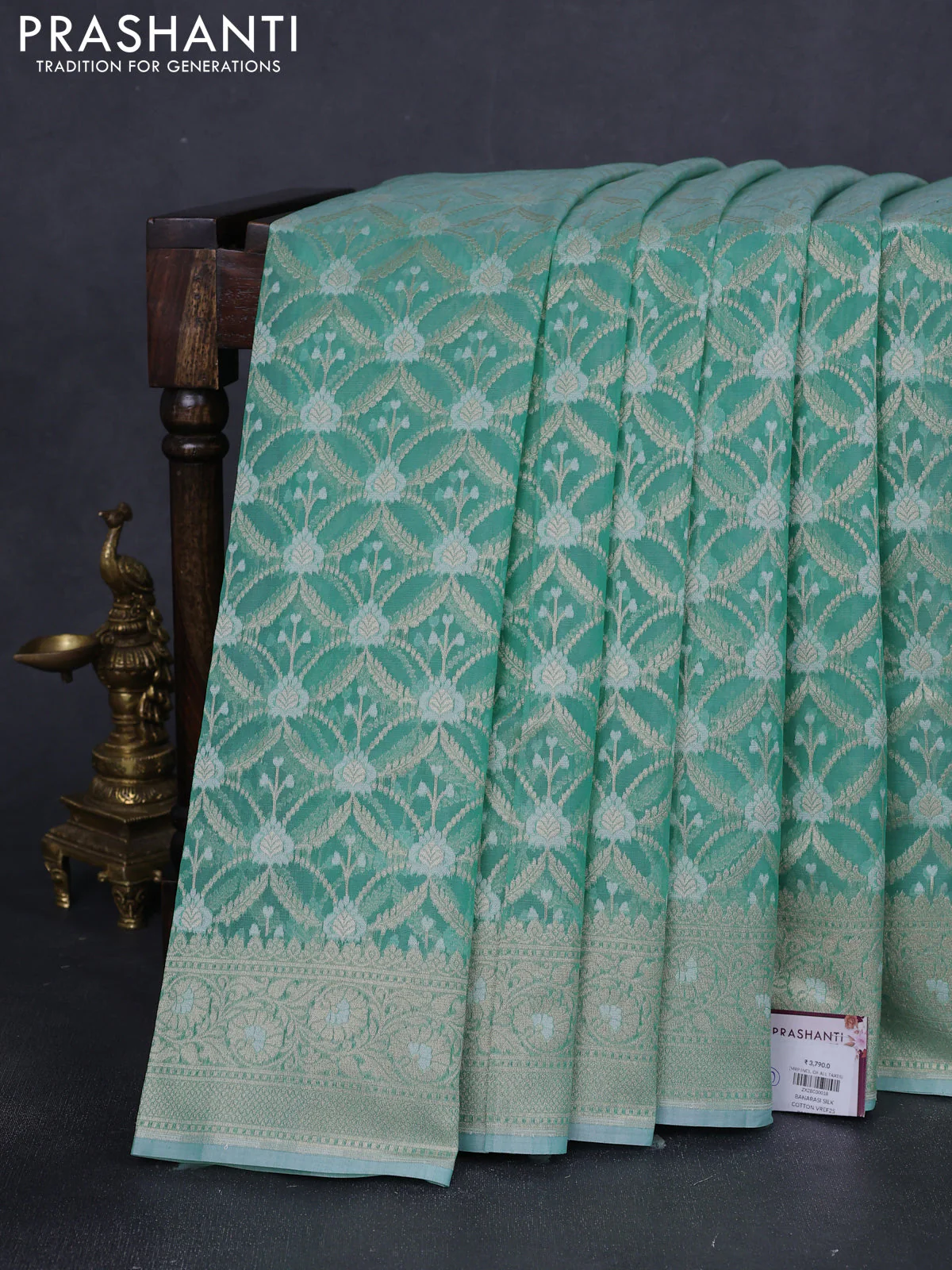Banarasi silk cotton saree teal shade with allover zari weaves and zari woven border