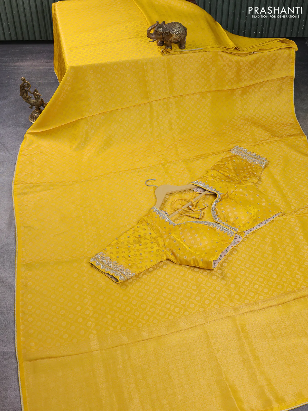 Banarasi silk saree yellow with allover zari woven brocade weaves and lace work border