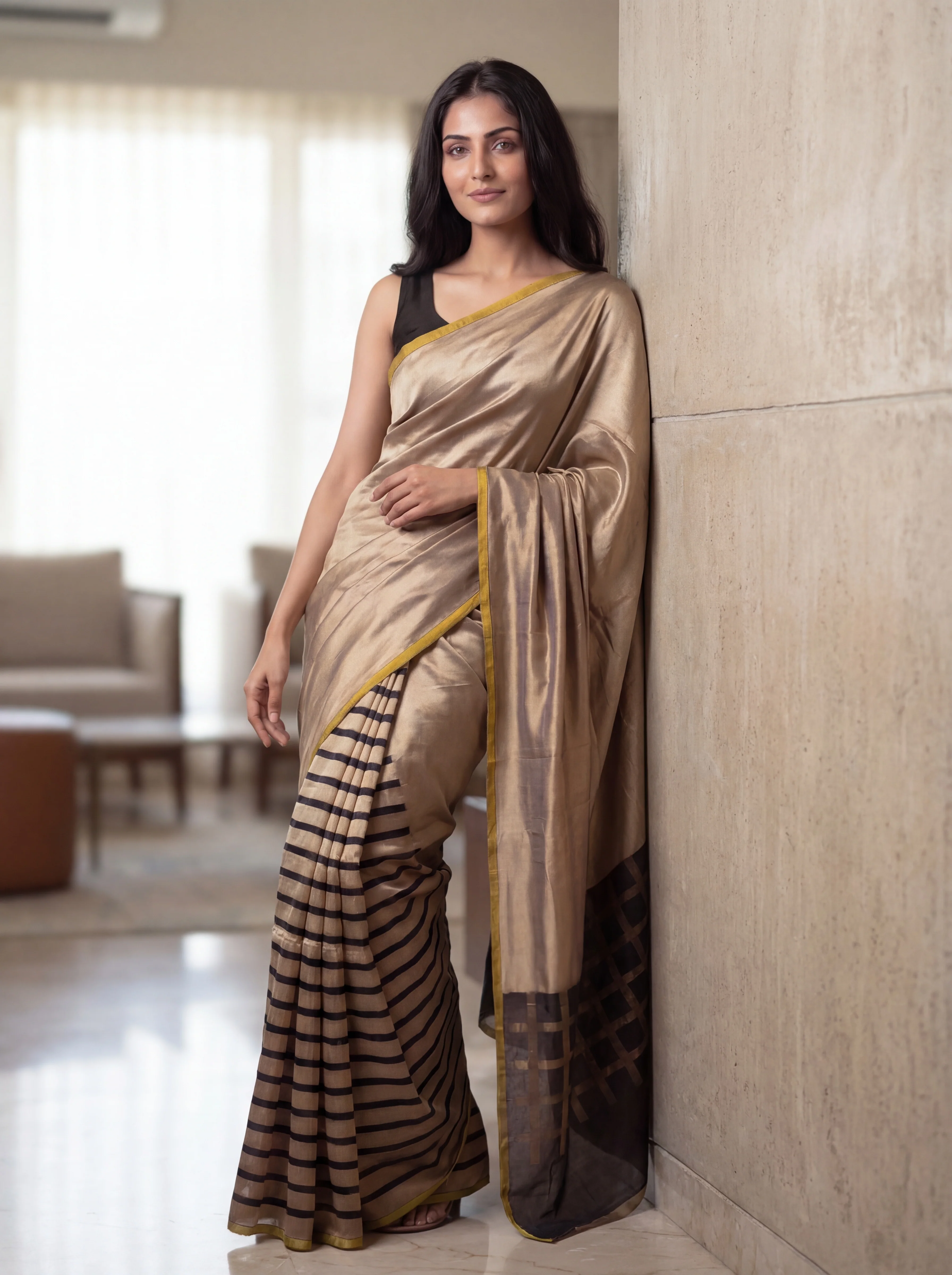 Banarasi tissue partly saree gold and black with plain body and piping border