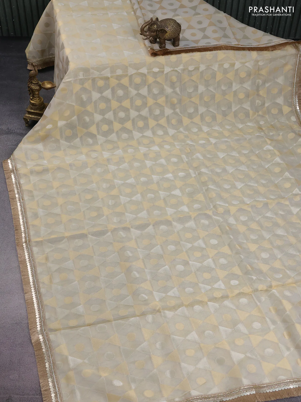 Banarasi tissue saree beige and mustard yellow with allover zari woven geometric wevaes and lace work border - Image 2