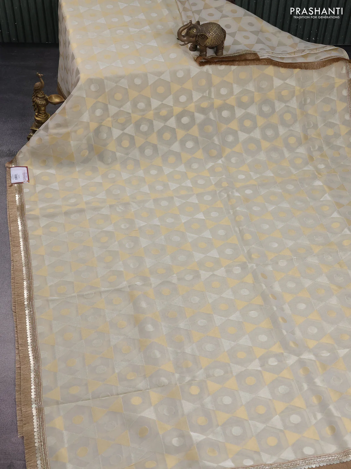 Banarasi tissue saree beige and pink with allover zari woven geometric wevaes and lace work border - Image 2