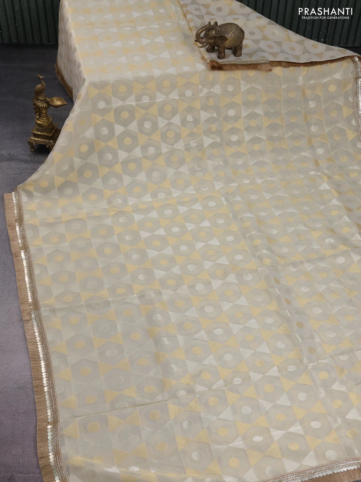 Banarasi tissue saree beige and red with allover zari woven geometric wevaes and lace work border - Image 2