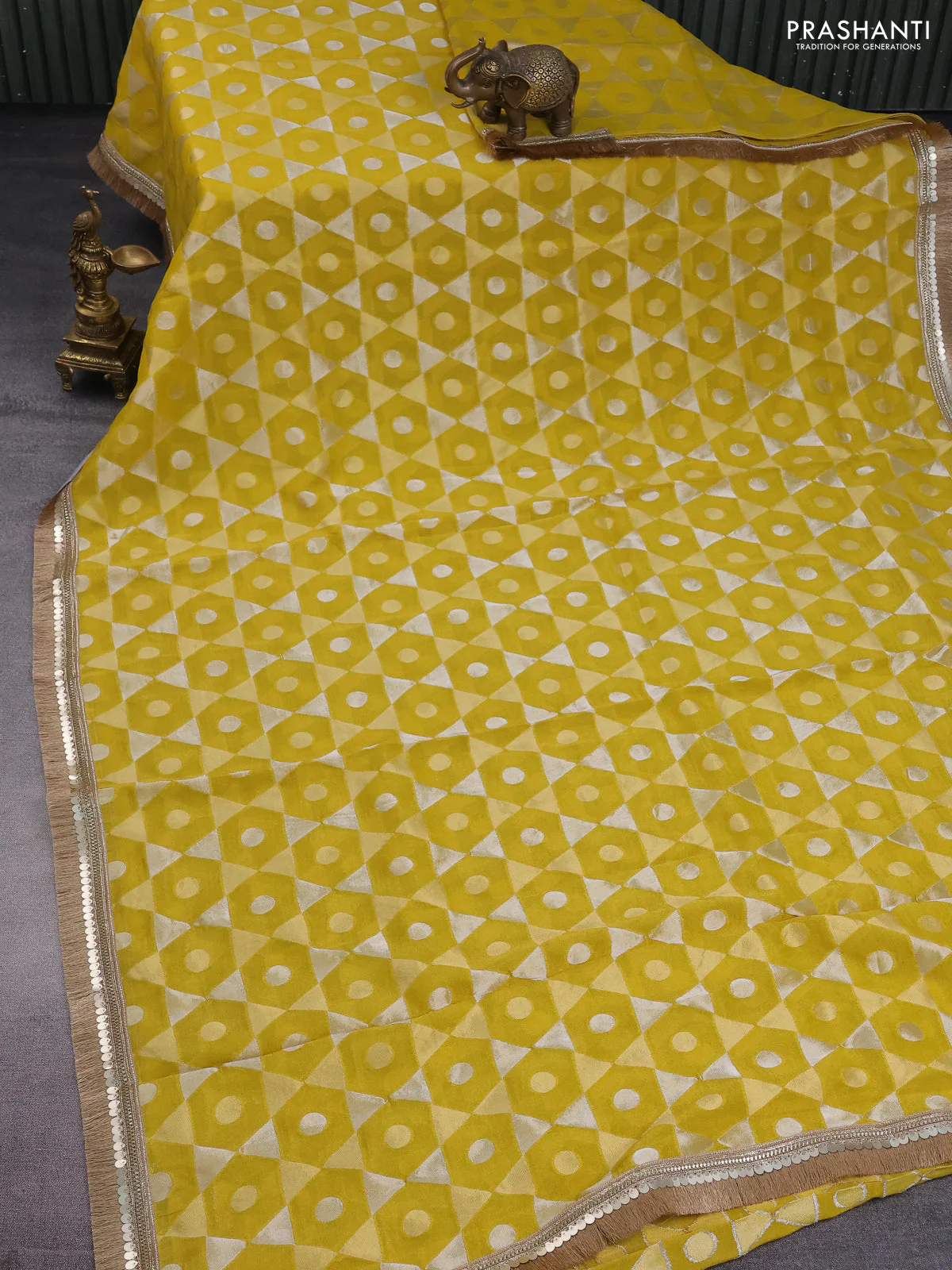 Banarasi tissue saree mustard yellow and red with allover zari woven geometric wevaes and lace work border - Image 2