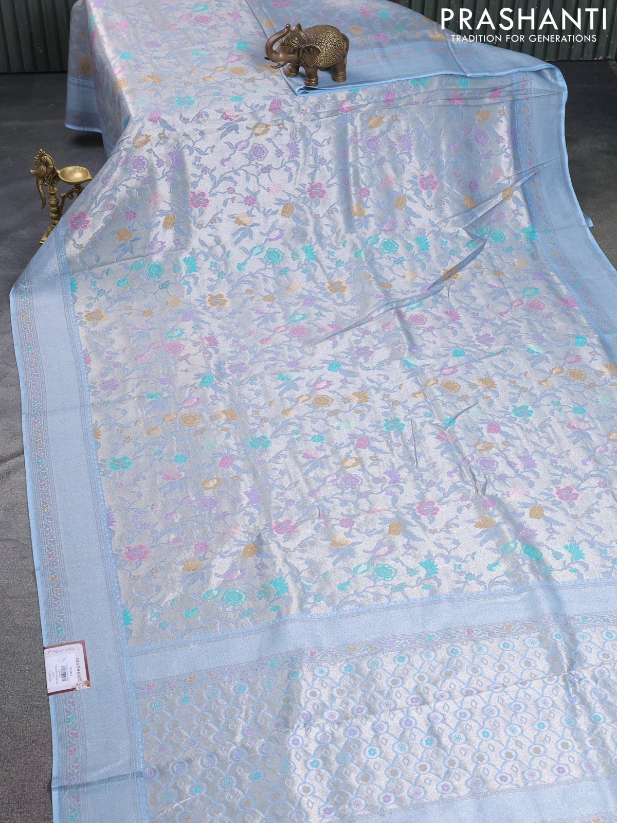 Banarasi tissue silk saree light blue with allover thread woven floral weaves and silver zari woven border - Image 2