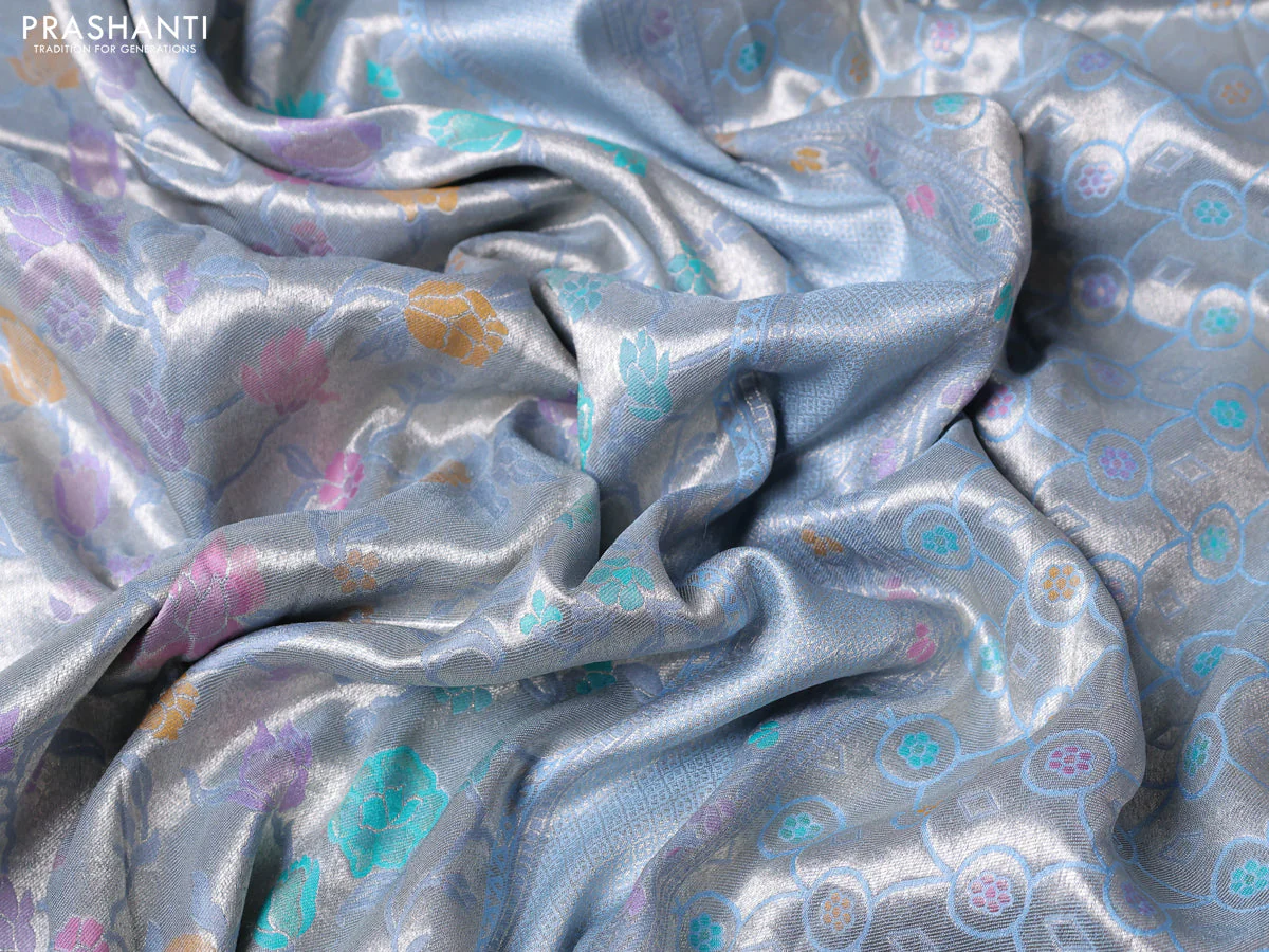 Banarasi tissue silk saree light blue with allover thread woven floral weaves and silver zari woven border - Image 3
