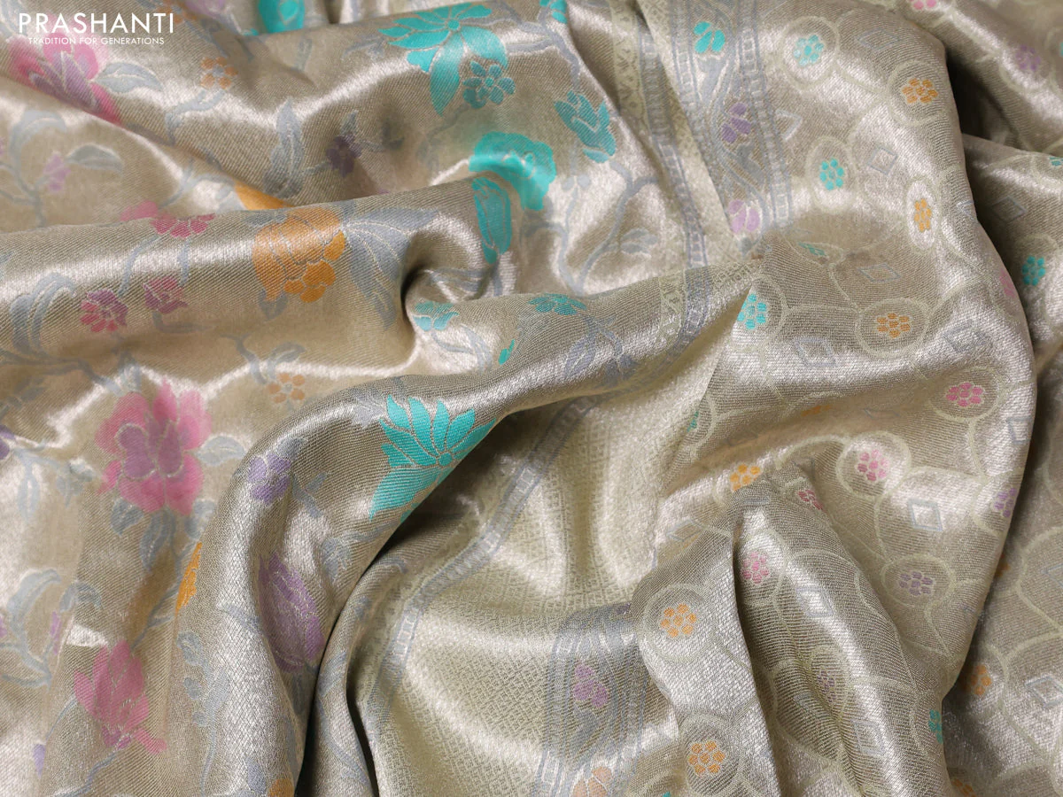 Banarasi tissue silk saree mild pista green with allover thread woven floral weaves and silver zari woven border - Image 3