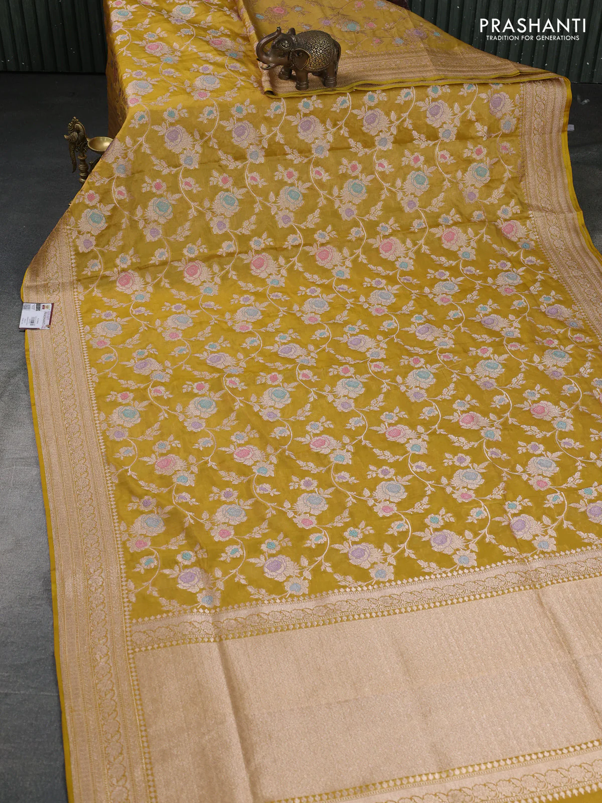 Banarasi tissue silk saree mustard yellow with allover floral zari woven brocade weaves and zari woven border - Image 2