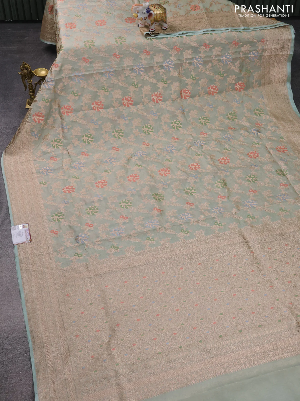 Banarasi tissue silk saree pastel green shade with allover thread & zari woven floral weaves and zari woven border - Image 2