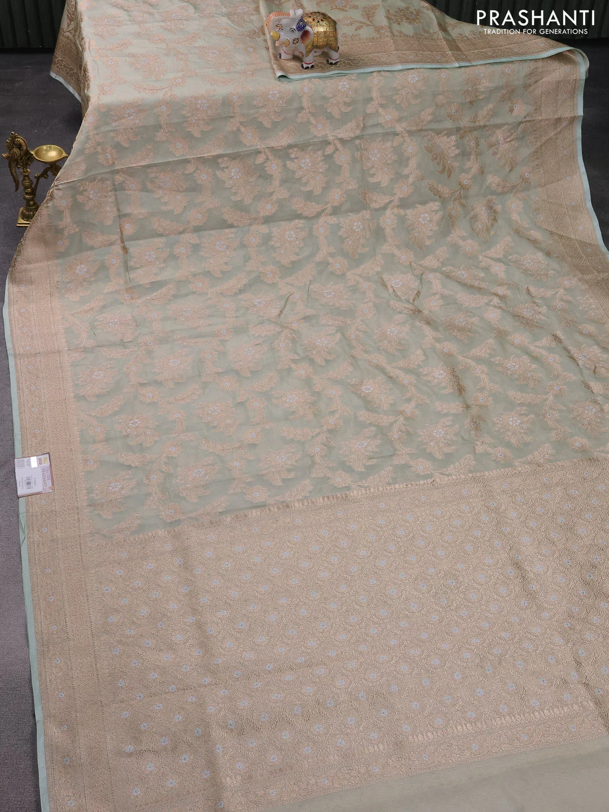 Banarasi tissue silk saree pastel green with allover zari woven brocade weaves and zari woven border - Image 2