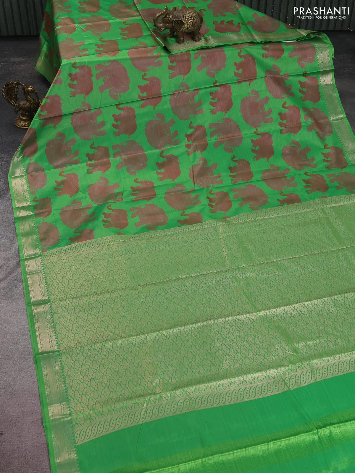 Bangalori semi silk saree green with allover elephant butta ikat weaves and zari woven border - Image 2