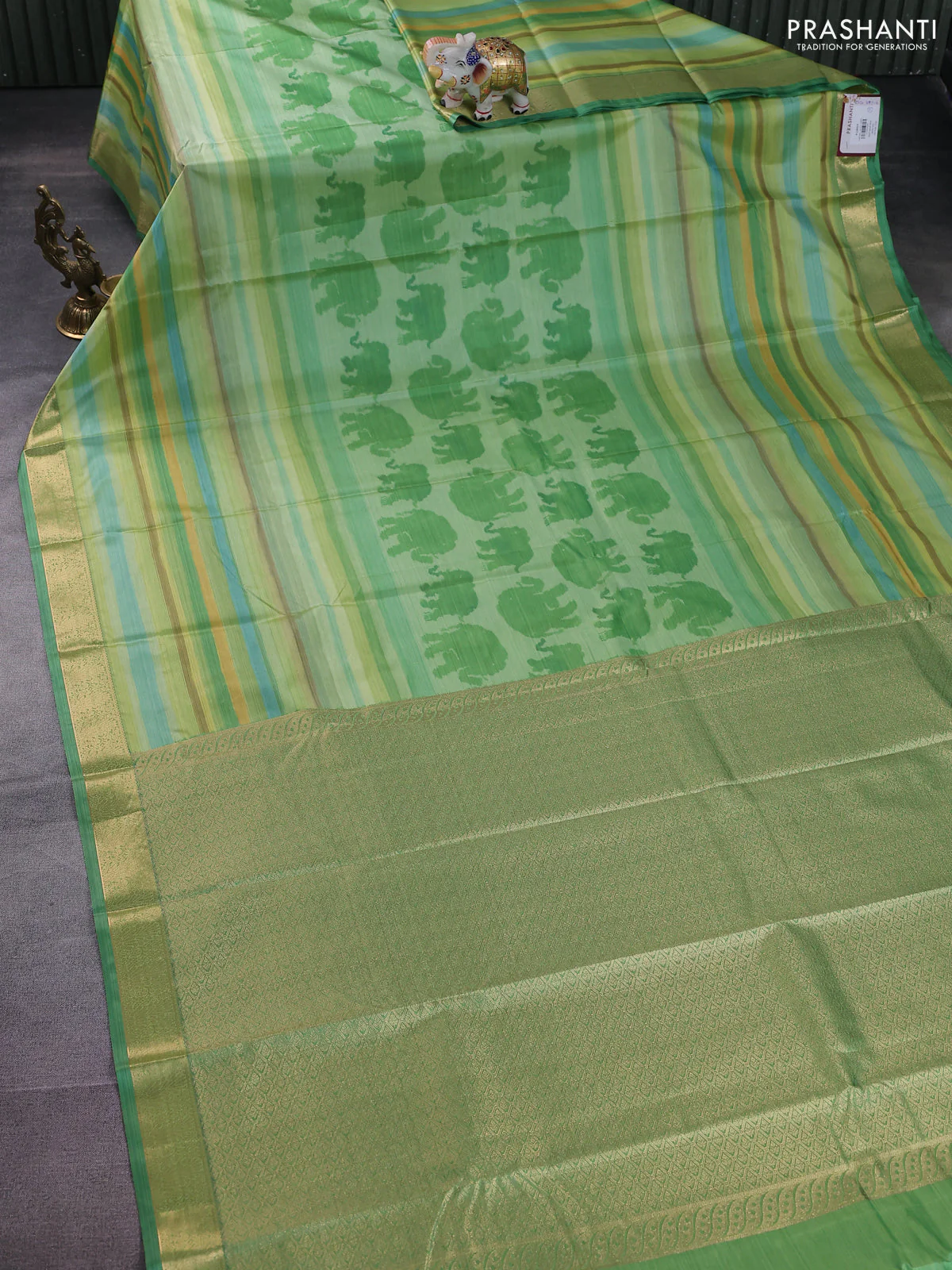 Bangalori semi silk saree light gree and green with allover elephant butta ikat weaves and zari woven border - Image 2