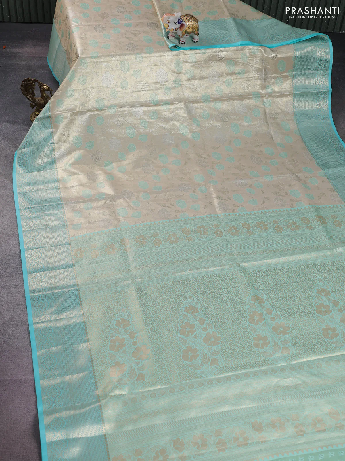 Bangalori tissue silk saree beige and teal blue with zari woven floral design brocade pattern and zari woven border - Image 2