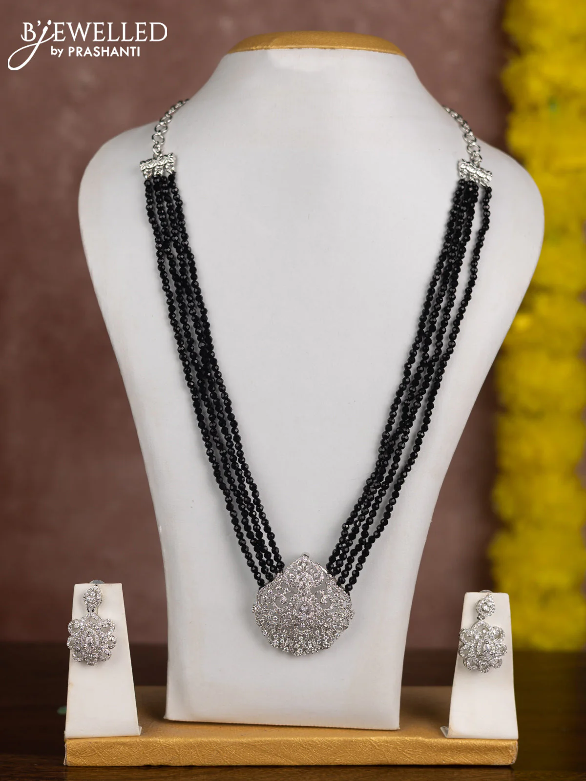 Beaded black necklace with cz stones in zircon finish