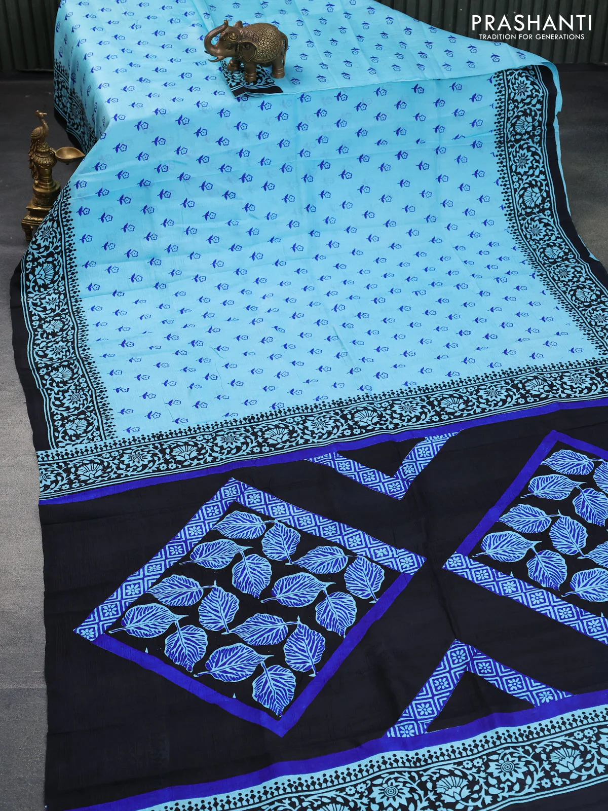 Bishnupuri silk saree light blue and black with floral butta prints and printed border - Image 2