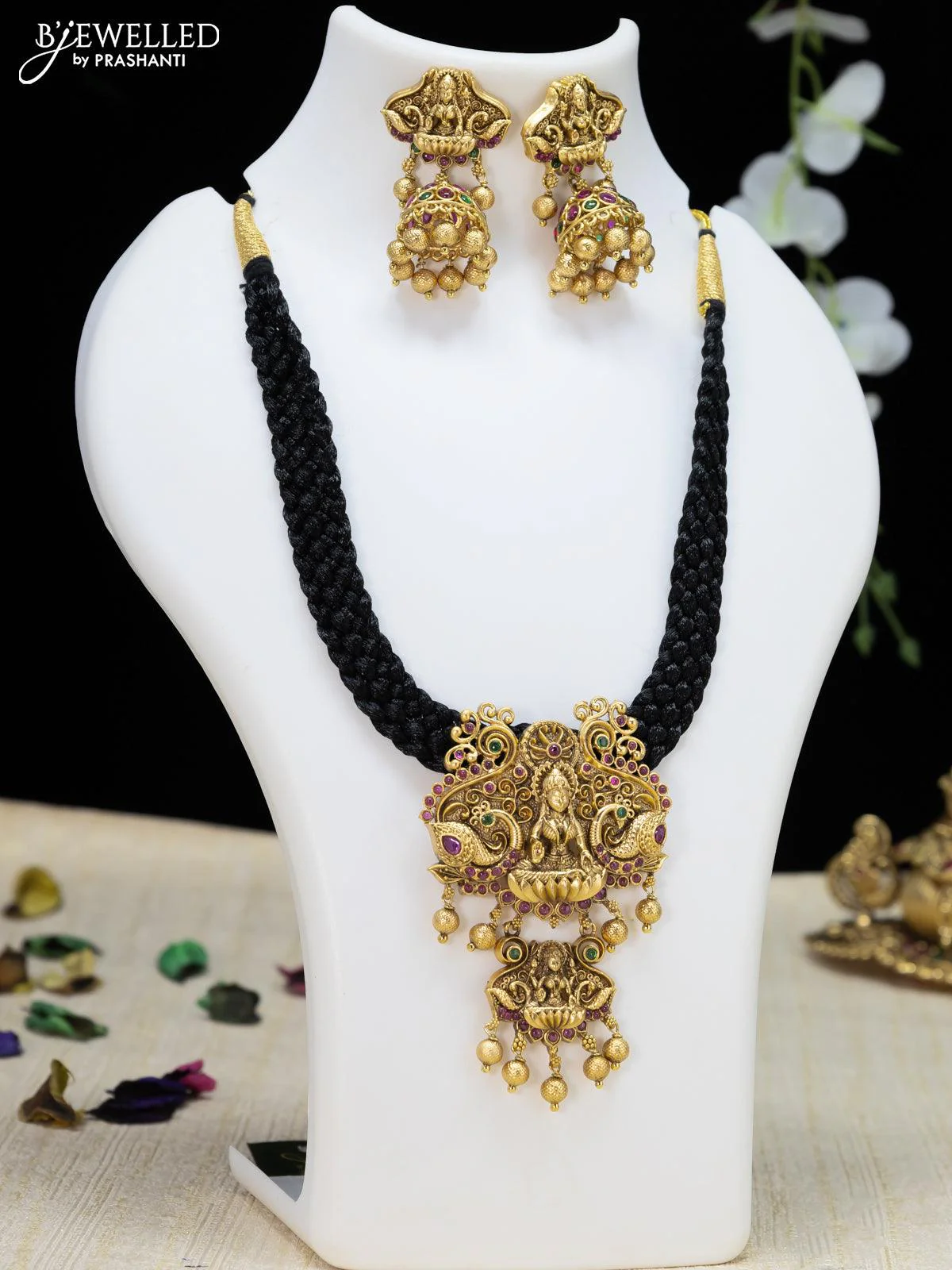 Black thread necklace with kemp stone and lakshmi pendant