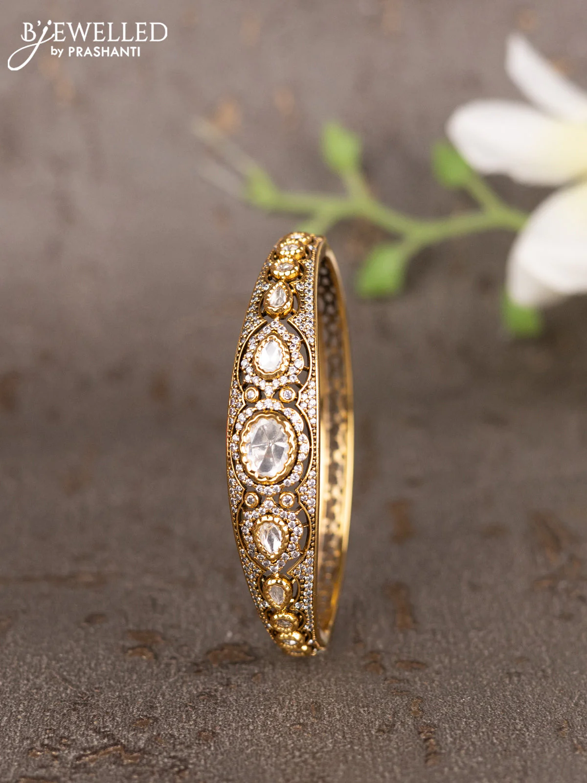 Bracelets with kundan and cz stones in gold finish