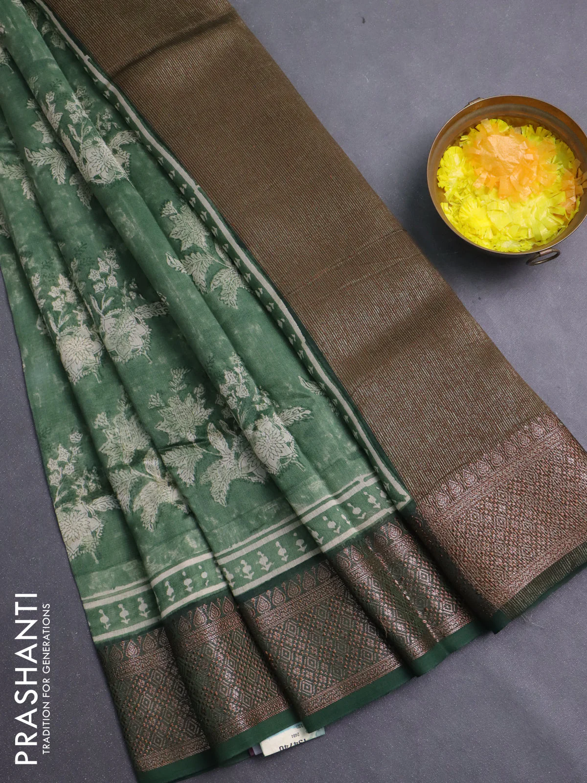 Chanderi silk cotton saree sap green with allover prints and banarasi style border