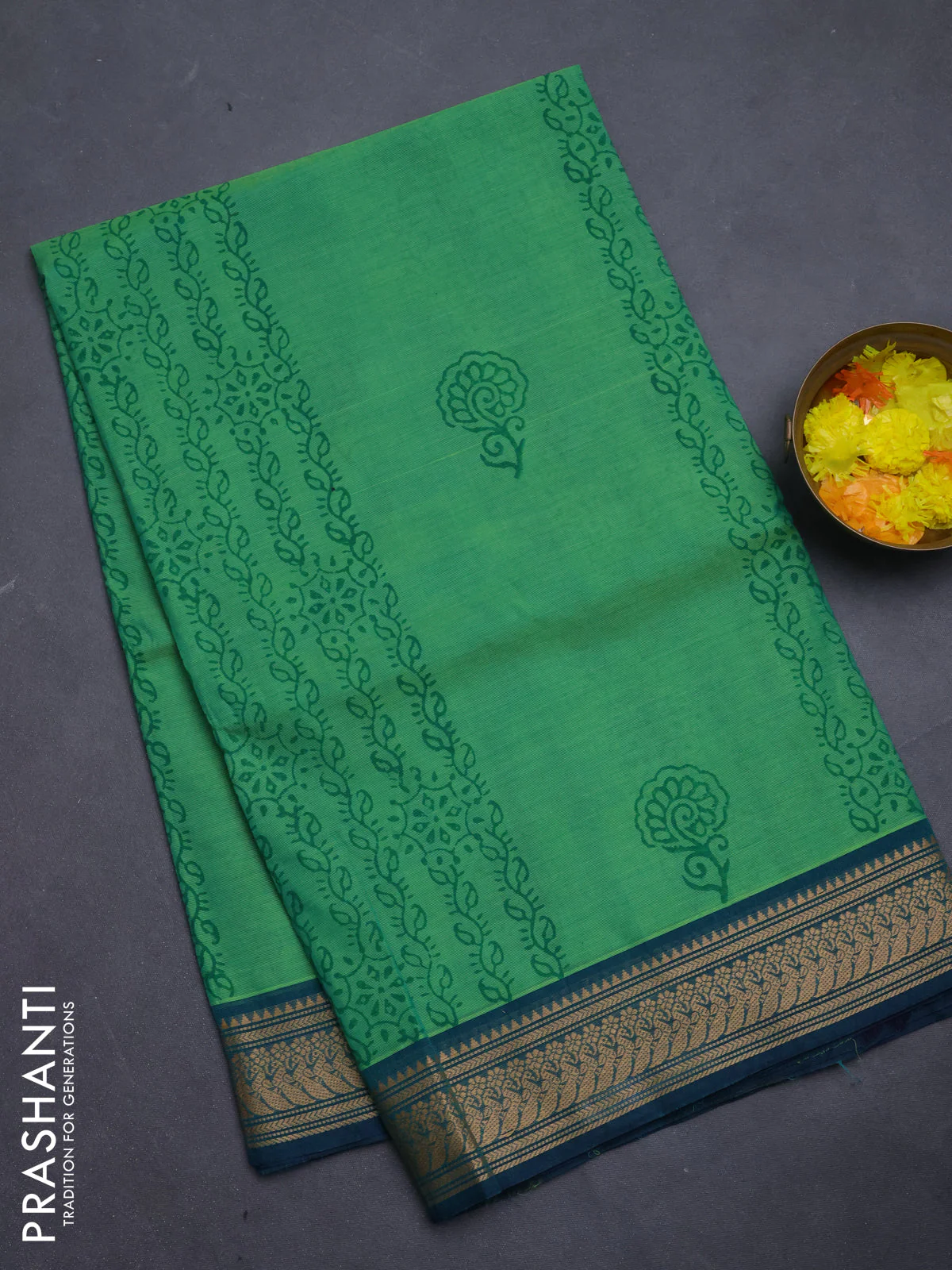 Chettinad cotton saree green and teal green with allover prints and temple thread woven border