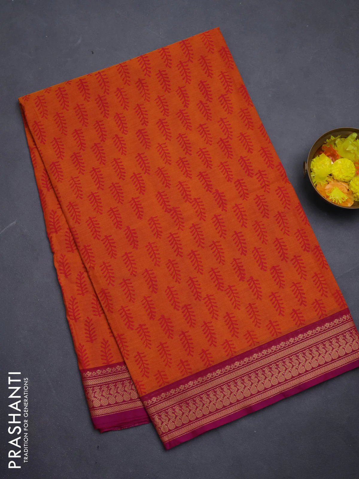Chettinad cotton saree orange and purple with allover prints and thread woven border