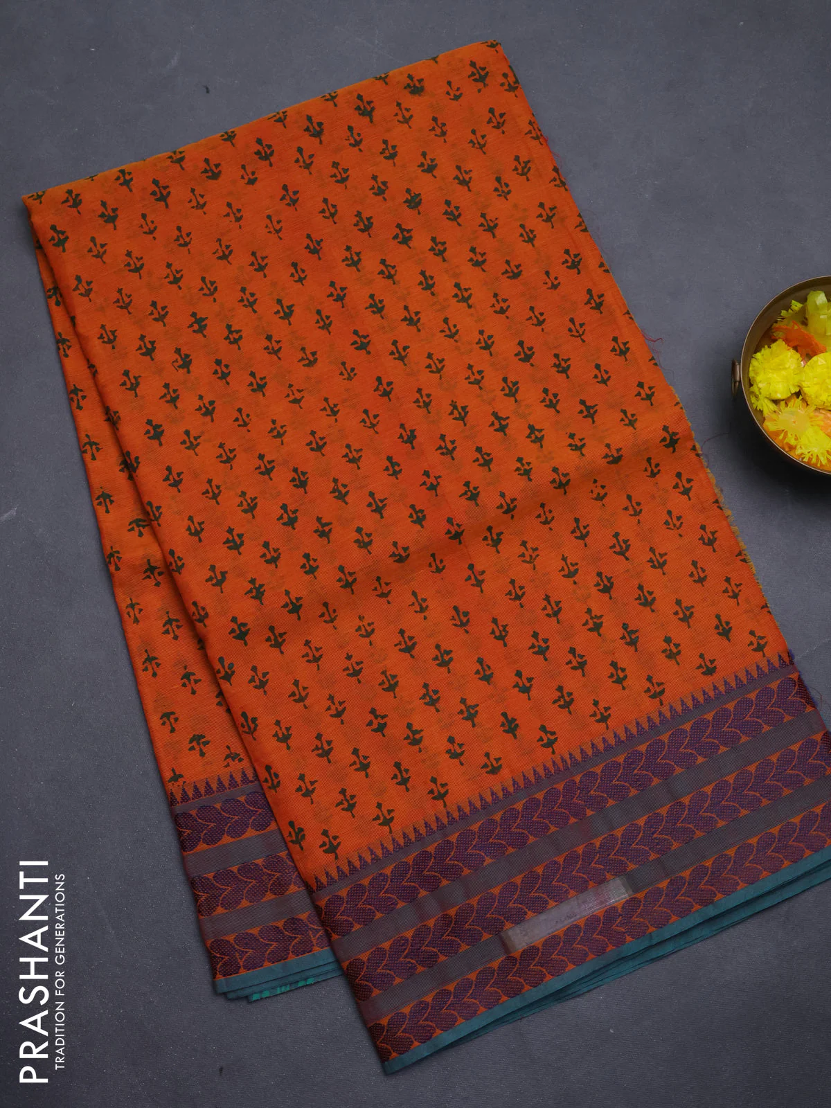 Chettinad cotton saree orange and teal green with allover prints and thread woven border