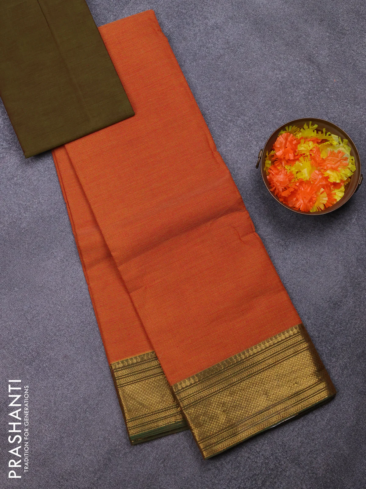 Chettinad cotton saree rust shade and green with allover small checked pattern and zari woven border