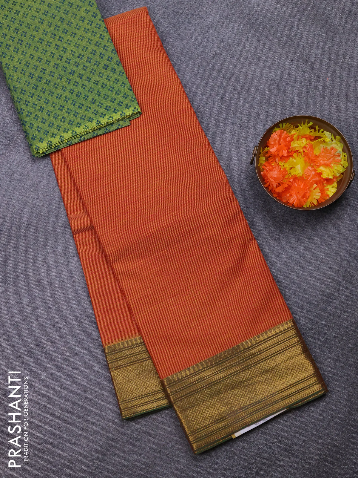 Chettinad cotton saree rust shade and green with allover small checked pattern and zari woven border